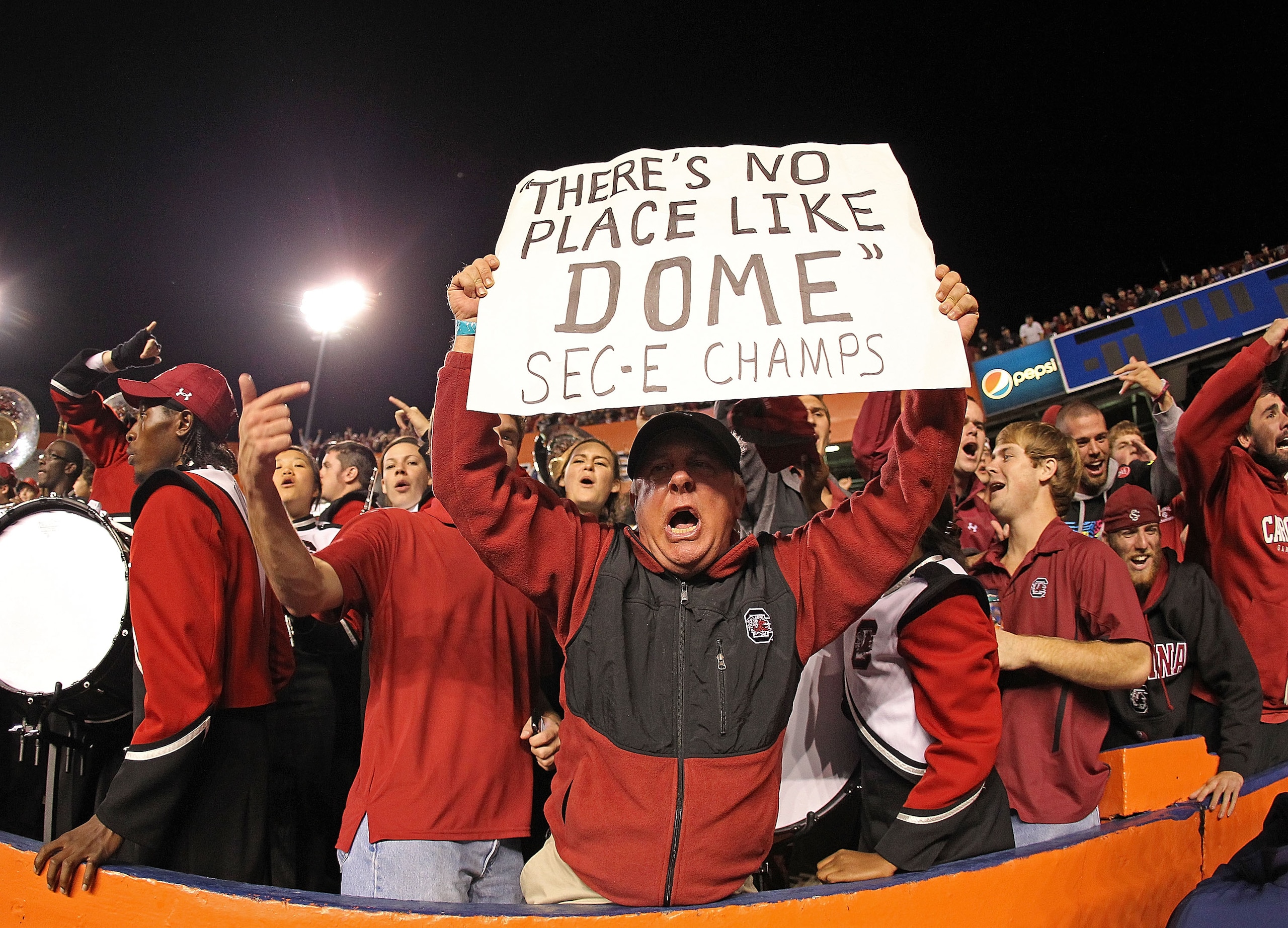 GAINESVILLE, FL - NOVEMBER 13: A South Carolina Gamecocks fan holds a sign claiming the SEC East Champions during a game against the Florida Gators at Ben Hill Griffin Stadium on November 13, 2010 in Gainesville, Florida. The Gamecocks beat the Gators 36 GAINESVILLE, FL - NOVEMBER 13: A South Carolina Gamecocks fan holds a sign claiming the SEC East Champions during a game against the Florida Gators at Ben Hill Griffin Stadium on November 13, 2010 in Gainesville, Florida. The Gamecocks beat the Gators 36