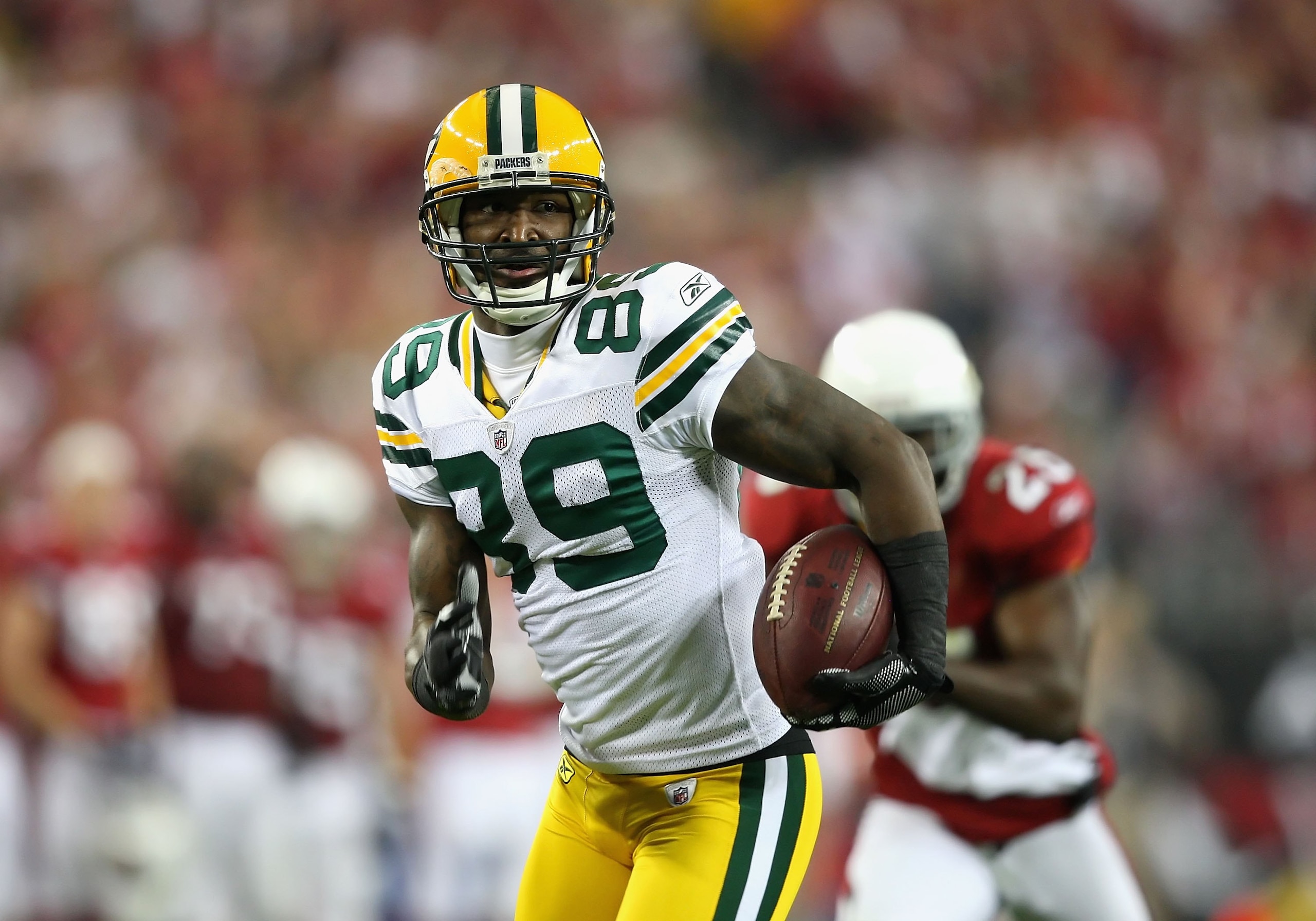 GLENDALE, AZ - JANUARY 10:  Wide receiver James Jones #89 of the Green Bay Packers runs with the football during the 2010 NFC wild-card playoff game against the Arizona Cardinals at the Universtity of Phoenix Stadium on January 10, 2010 in Glendale, Arizo