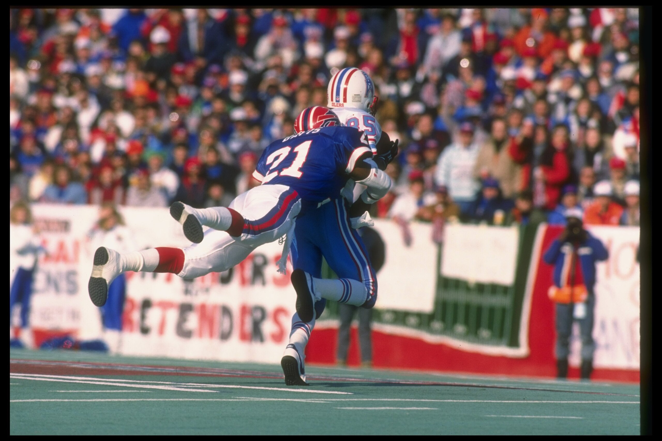1 Jan 1989: Defensive back Wayne Davis of the Buffalo Bills (left) tackles Houston Oilers wide receiver Drew Hill during a playoff game at Rich Stadium in Orchard Park, New York. The Bills won the game, 17-10. Mandatory Credit: Rick Stewart /Allsport 1 Jan 1989: Defensive back Wayne Davis of the Buffalo Bills (left) tackles Houston Oilers wide receiver Drew Hill during a playoff game at Rich Stadium in Orchard Park, New York. The Bills won the game, 17-10. Mandatory Credit: Rick Stewart /Allsport