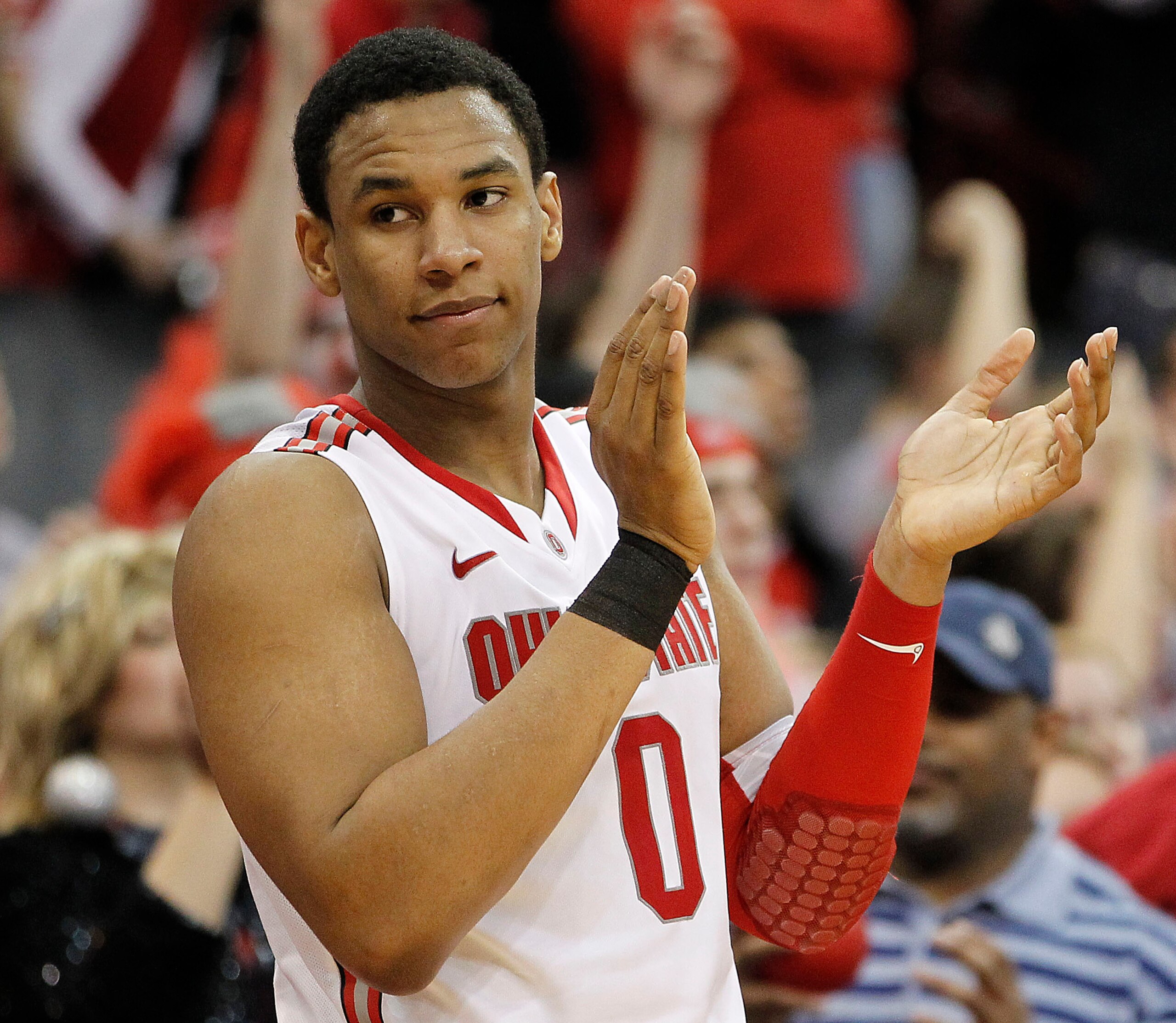 COLUMBUS, OH - FEBRUARY 15:  Jared Sullinger #0 of the Ohio State Buckeyes appluads his teammates as Ohio State defeated the Michigan State Spartans 71-61 on February 15, 2011 at Value City Arena in Columbus, Ohio.  (Photo by Gregory Shamus/Getty Images)