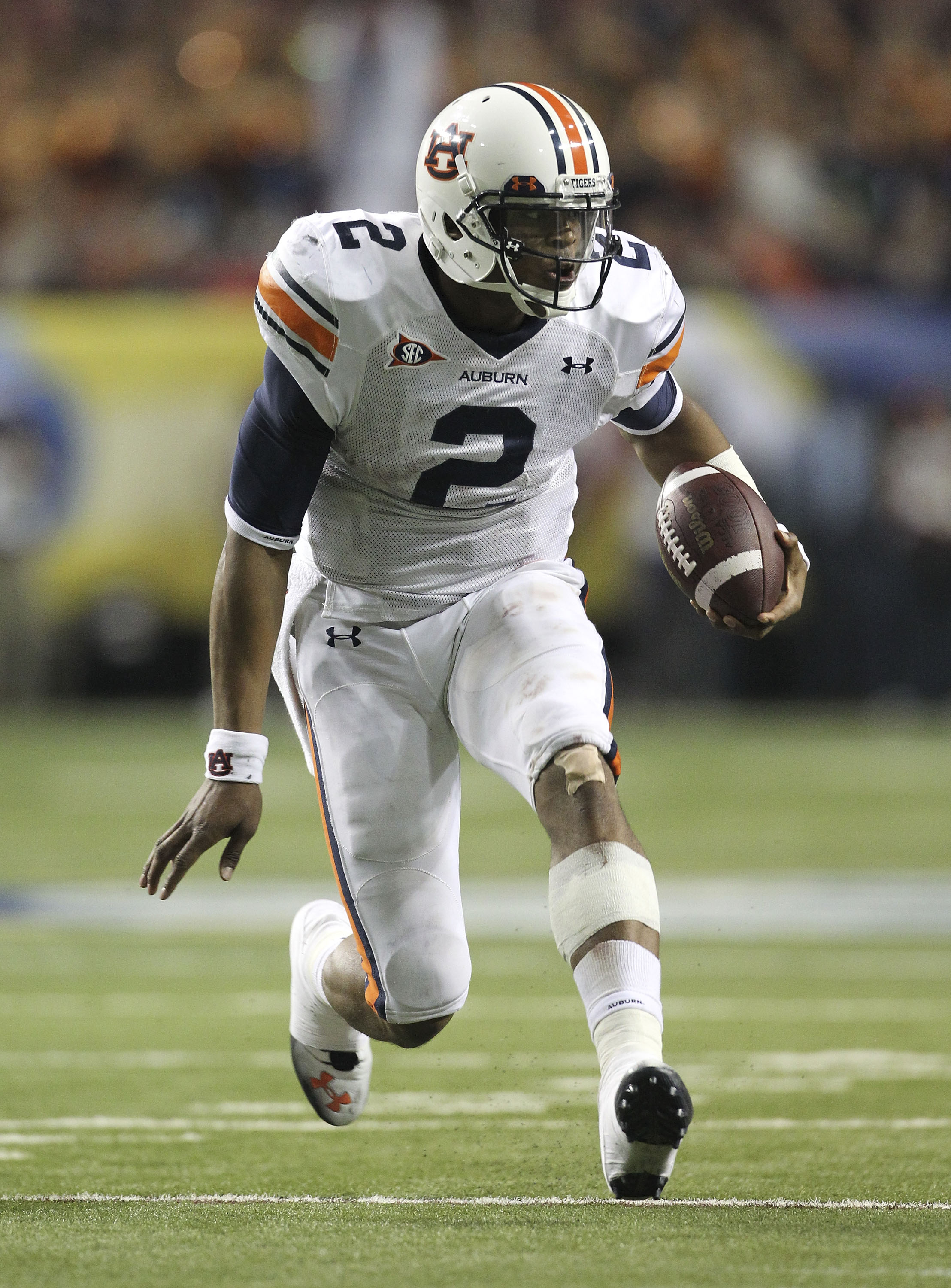 ATLANTA - DECEMBER 04:  Quarterback Cam Newton #2 of the Auburn Tigers runs with the ball during the 2010 SEC Championship against the South Carolina Gamecocks at Georgia Dome on December 4, 2010 in Atlanta, Georgia.  (Photo by Mike Zarrilli/Getty Images)