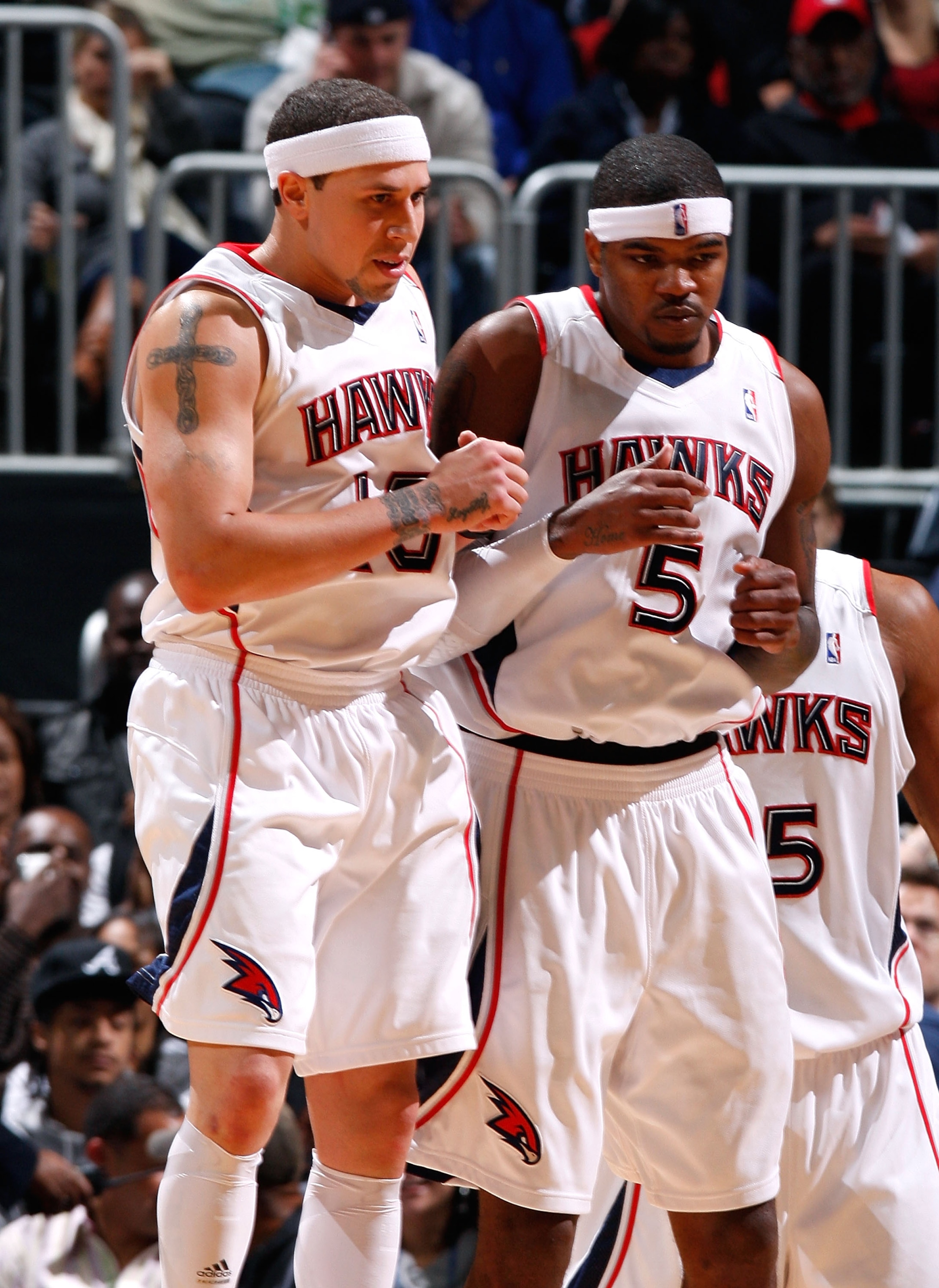 ATLANTA - NOVEMBER 18: Mike Bibby #10 and Josh Smith #5 of the Atlanta Hawks celebrate a basket against the Miami Heat at Philips Arena on November 18, 2009 in Atlanta, Georgia. (Photo by Kevin C. Cox/Getty Images) ATLANTA - NOVEMBER 18: Mike Bibby #10 and Josh Smith #5 of the Atlanta Hawks celebrate a basket against the Miami Heat at Philips Arena on November 18, 2009 in Atlanta, Georgia. (Photo by Kevin C. Cox/Getty Images)