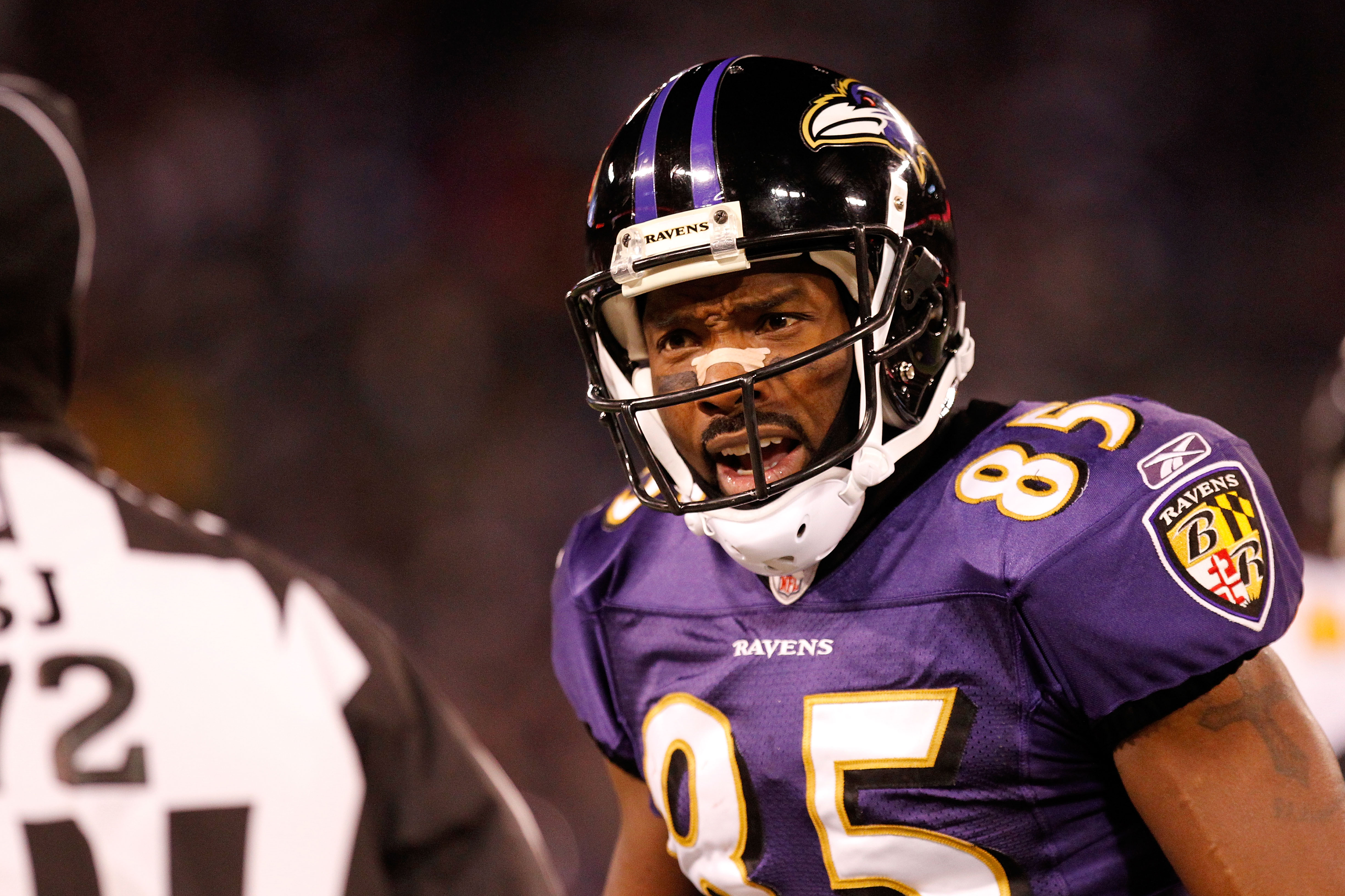 BALTIMORE, MD - DECEMBER 05:  Derrick Mason #85 of the Baltimore Ravens argues a call with a referee during the game against the Pittsburgh Steelers at M&T Bank Stadium on December 5, 2010 in Baltimore, Maryland. Pittsburgh won 13-10.  (Photo by Geoff Bur