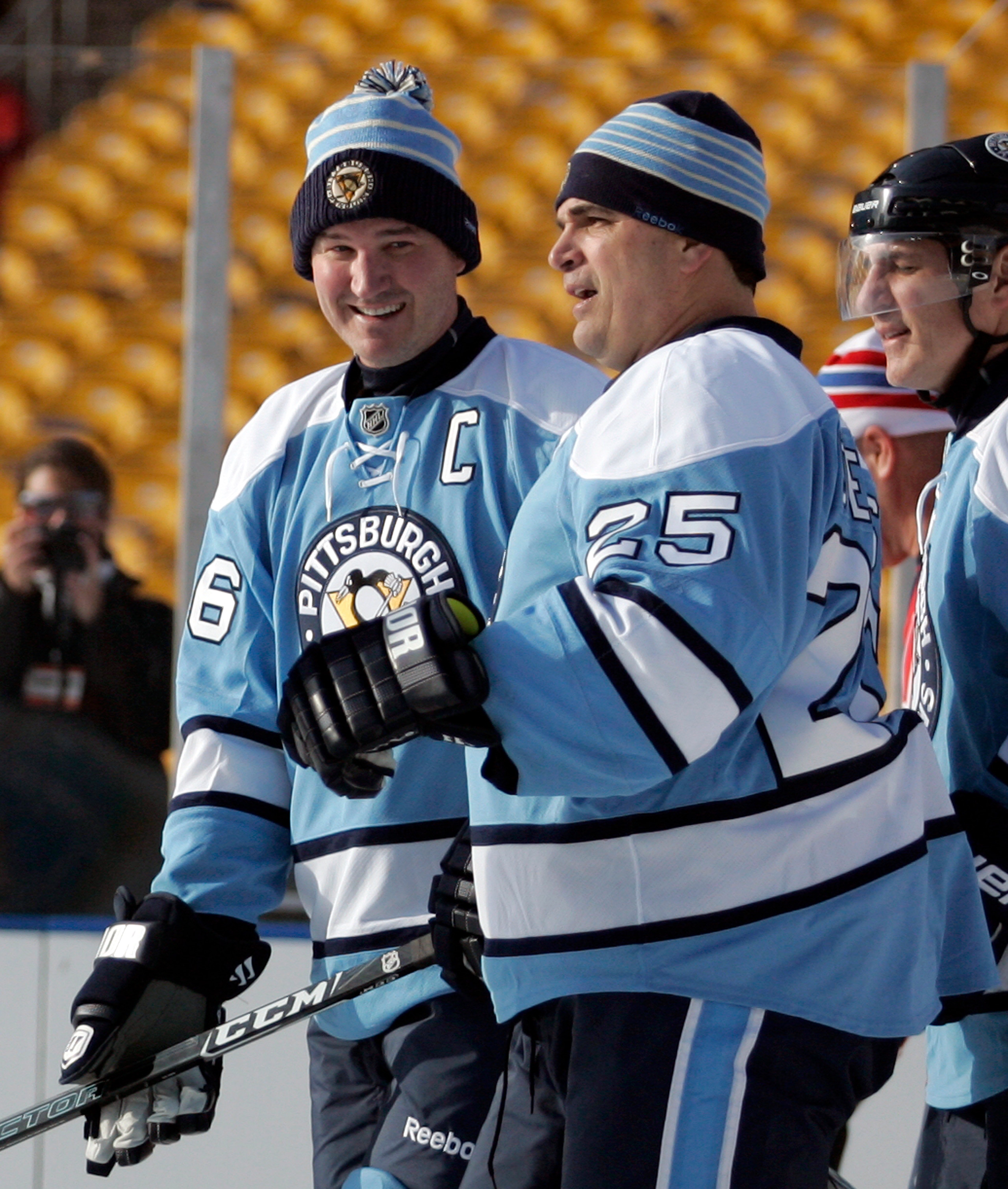 PITTSBURGH, PA - DECEMBER 31:  Mario Lemieux #66 of the Pittsburgh Penguins skates with Kevin Stevens #25 against the Washington Capitals during the 2011 NHL Winter Classic Alumni Game on December 31, 2010 at Heinz Field in Pittsburgh, Pennsylvania.  (Pho
