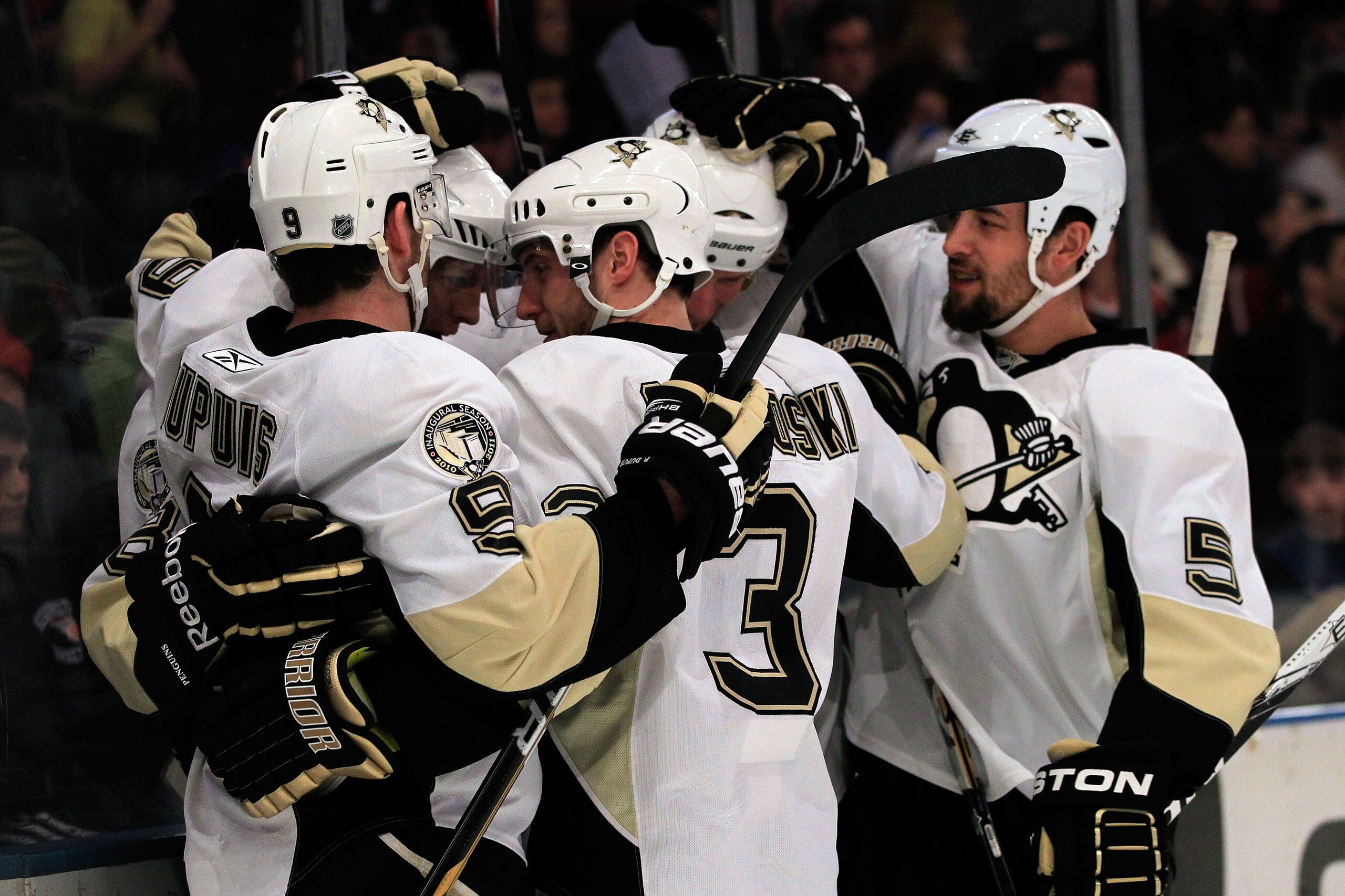 NEW YORK, NY - FEBRUARY 13:  Brent Johnson #1 of the Pittsburgh Penguins is congratulated by his teammates for his first period goal against the New York Rangers at Madison Square Garden on February 13, 2011 in New York City.  (Photo by Chris Trotman/Gett