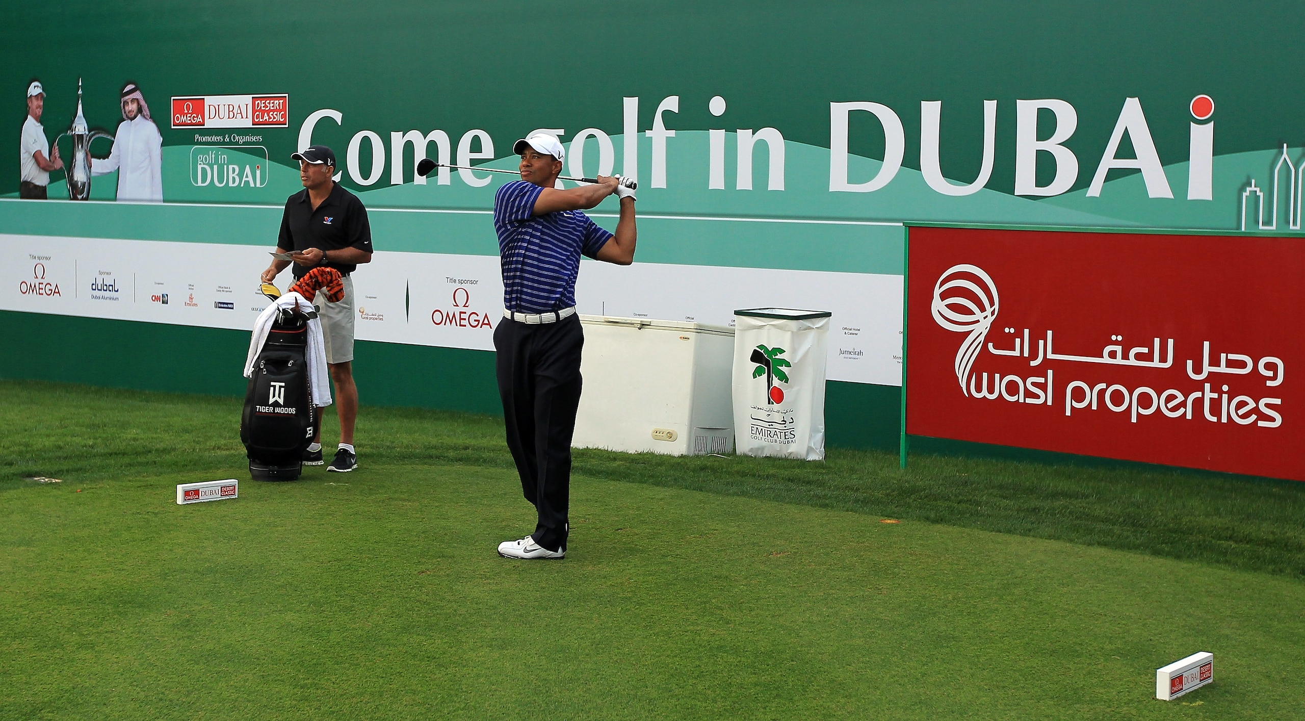 DUBAI, UNITED ARAB EMIRATES - FEBRUARY 09:  Tiger Woods of the USA in action during the pro-am for the 2011 Omega Dubai desert Classic held on the Majilis Course at the Emirates Golf Club on February 9, 2011 in Dubai, United Arab Emirates.  (Photo by Davi