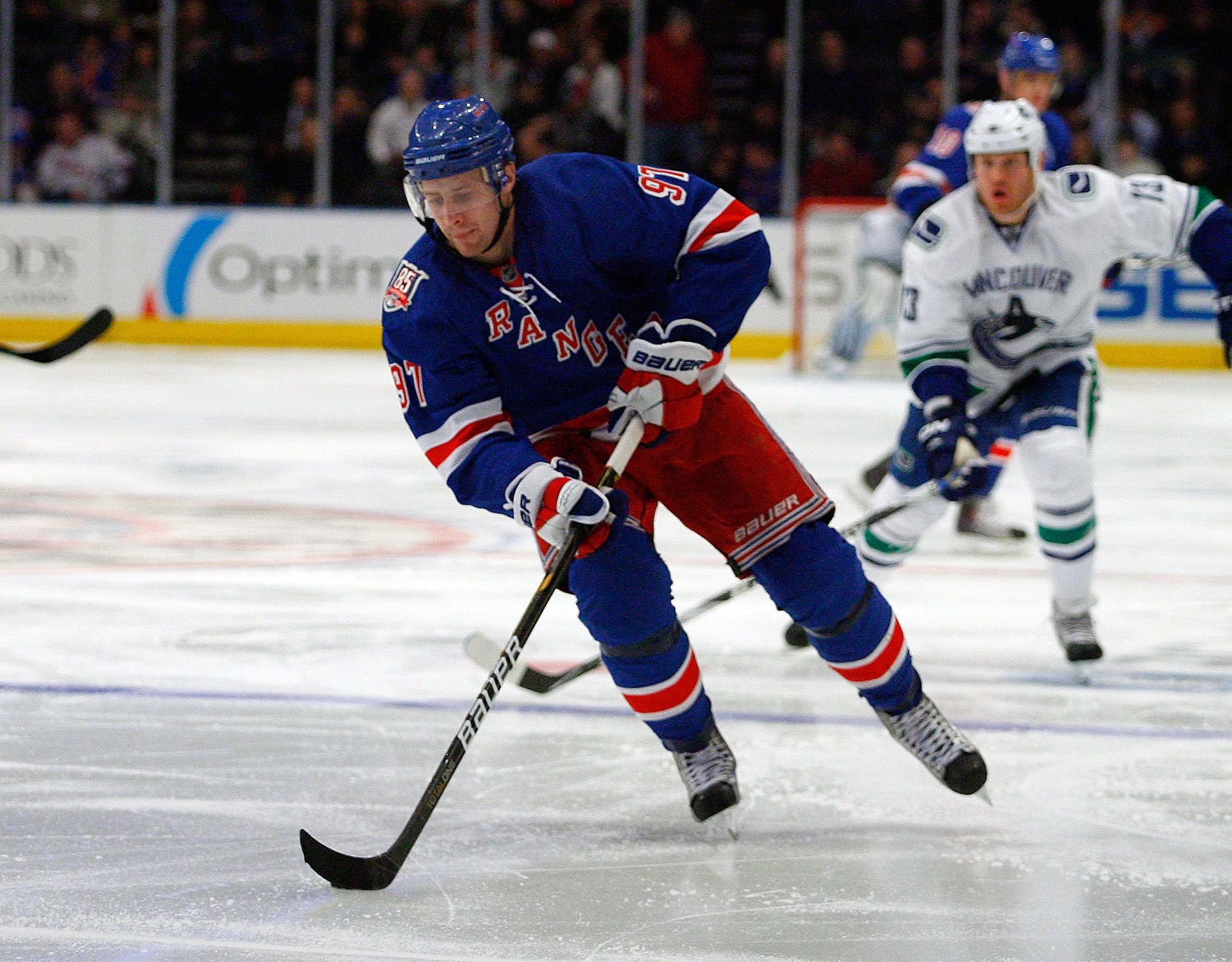 NEW YORK , NY - JANUARY 13: Matt Gilroy #97 of the New York Rangers plays the puck against the Vancouver Canucks during the game at Madison Square Garden on January 13, 2011 in New York City. (Photo by Andy Marlin/Getty Images) NEW YORK , NY - JANUARY 13: Matt Gilroy #97 of the New York Rangers plays the puck against the Vancouver Canucks during the game at Madison Square Garden on January 13, 2011 in New York City. (Photo by Andy Marlin/Getty Images)