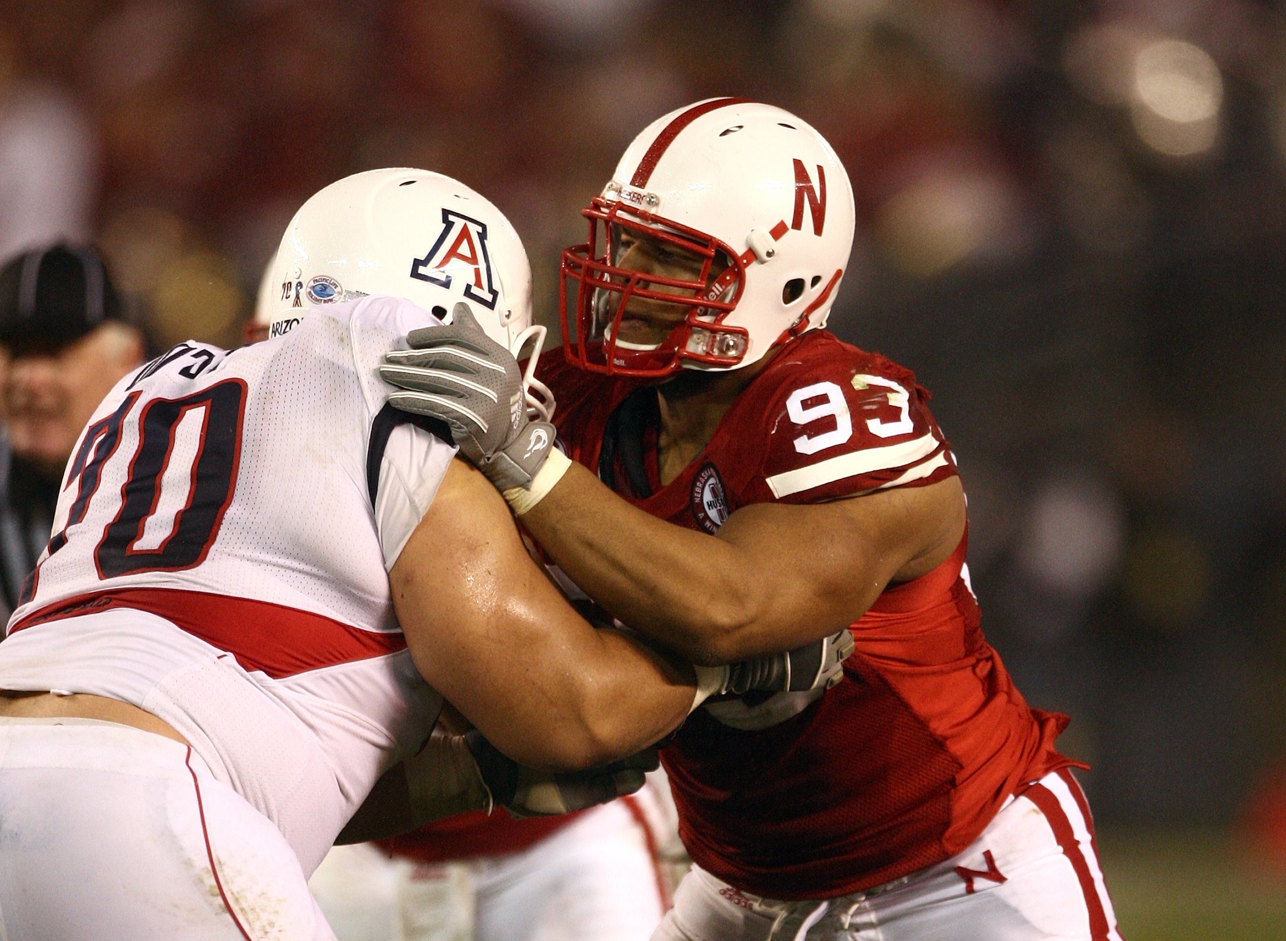 SAN DIEGO - DECEMBER 30:  Ndamukong Suh #93 of the University of Nebraska Cornhuskers engages an offensive lineman during the Pacific Life Holiday Bowl against University of Arizona Wildcats on December 30, 2009 at Qualcomm Stadium in San Diego, Californi