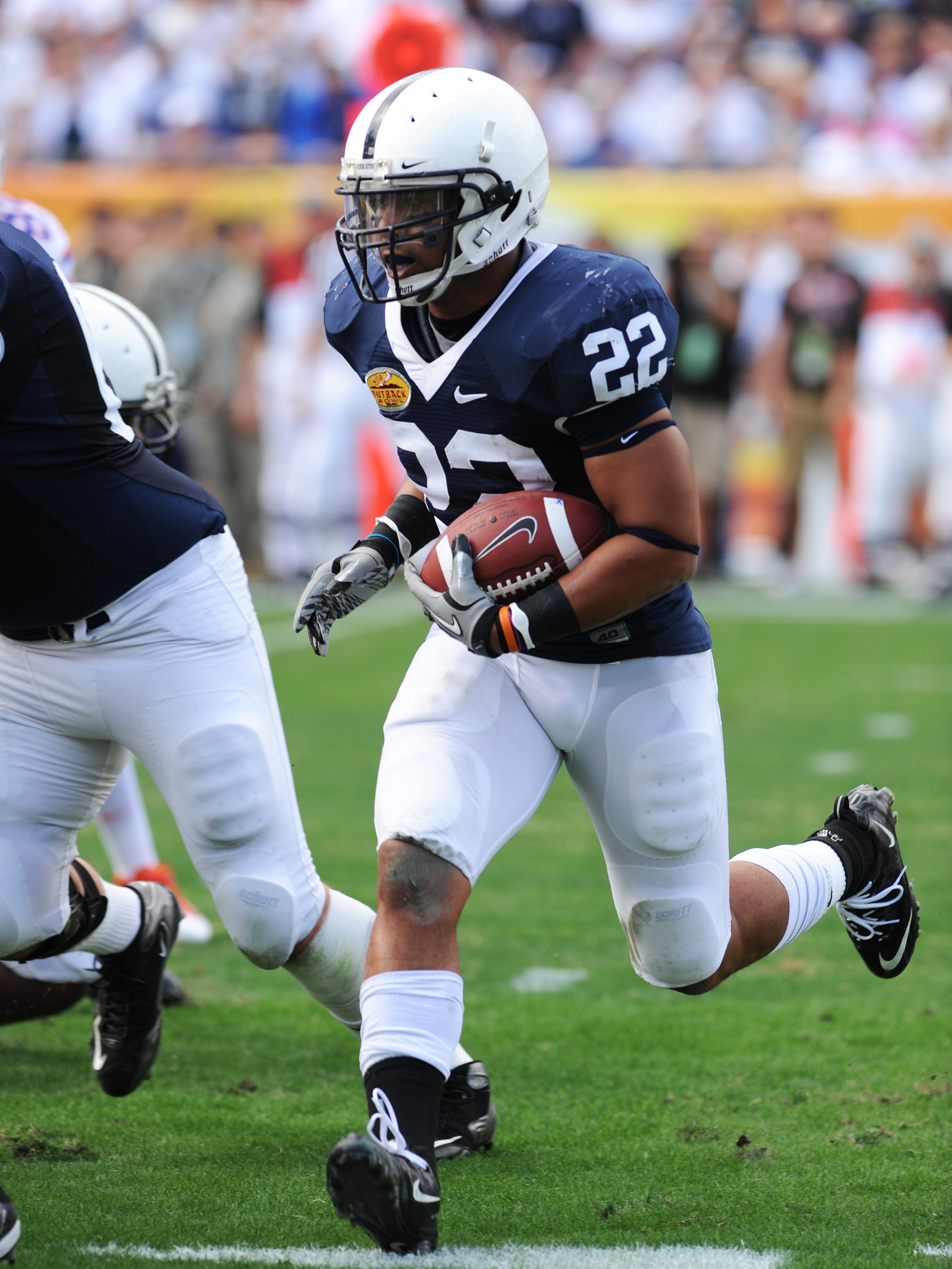 TAMPA, FL - JANUARY 1: Running back Evan Royster #22 of the Penn State Nittany Lions rushes upfield against the Florida Gators January 1, 2010 in the 25th Outback Bowl at Raymond James Stadium in Tampa, Florida. (Photo by Al Messerschmidt/Getty Images) TAMPA, FL - JANUARY 1: Running back Evan Royster #22 of the Penn State Nittany Lions rushes upfield against the Florida Gators January 1, 2010 in the 25th Outback Bowl at Raymond James Stadium in Tampa, Florida. (Photo by Al Messerschmidt/Getty Images)
