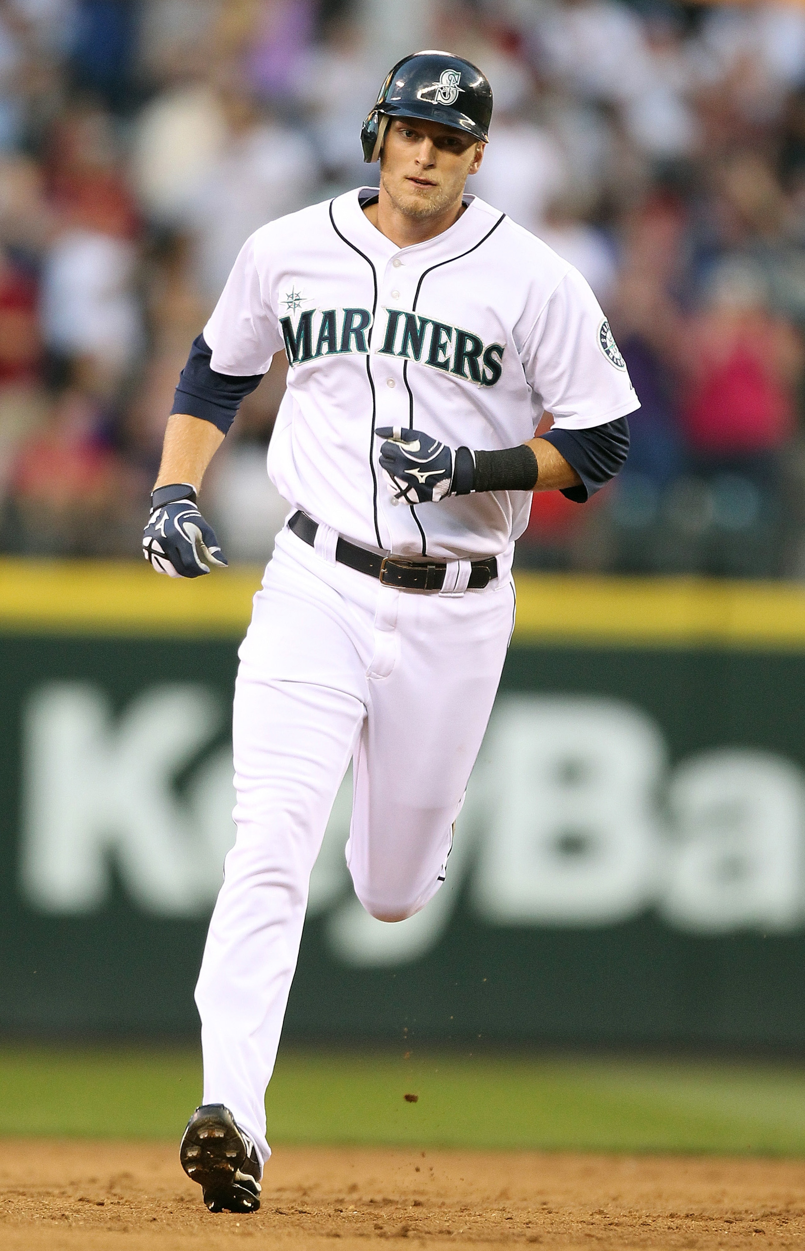 SEATTLE - JULY 24:  Michael Saunders #55 of the Seattle Mariners rounds the bases after hitting a two-run home run to break up a no-hitter in the sixth inning against the Boston Red Sox at Safeco Field on July 24, 2010 in Seattle, Washington. (Photo by Ot