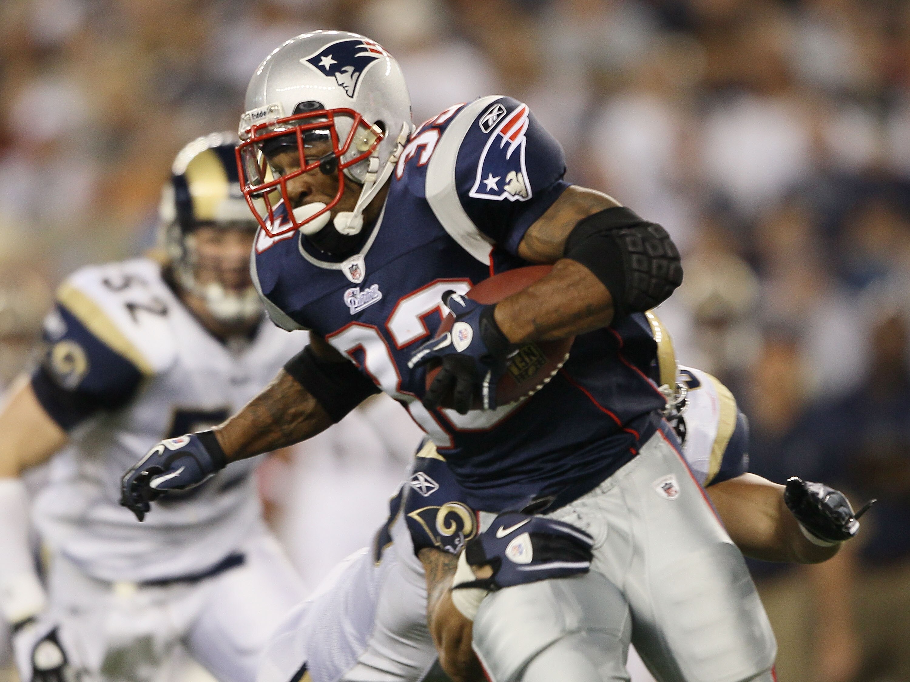 FOXBORO, MA - AUGUST 26:  Kevin Faulk #33 of the New England Patriots carries the ball in the first half against the St. Louis Rams on August 26, 2010 at Gillette Stadium in Foxboro, Massachusetts. The Rams defeated the Patriots 36-35. (Photo by Elsa/Gett
