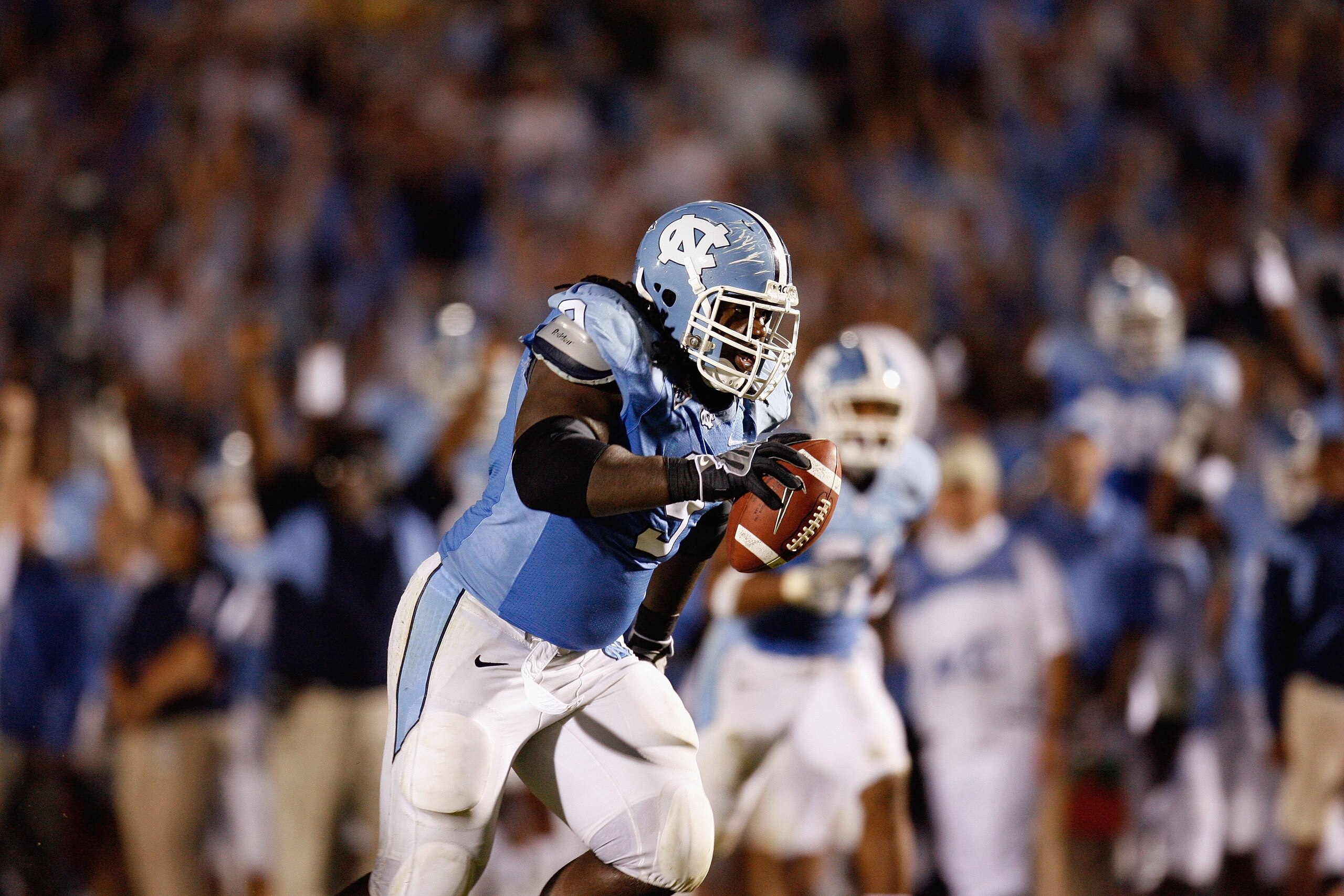 CHAPEL HILL, NC - OCTOBER 4: Marvin Austin #9 of the North Carolina Tar Heels returns an interception for a touchdown during the game against the Connecticut Huskies at Kenan Stadium on October 4, 2008 in Chapel Hill, North Carolina. (Photo by Kevin C. CHAPEL HILL, NC - OCTOBER 4: Marvin Austin #9 of the North Carolina Tar Heels returns an interception for a touchdown during the game against the Connecticut Huskies at Kenan Stadium on October 4, 2008 in Chapel Hill, North Carolina. (Photo by Kevin C.
