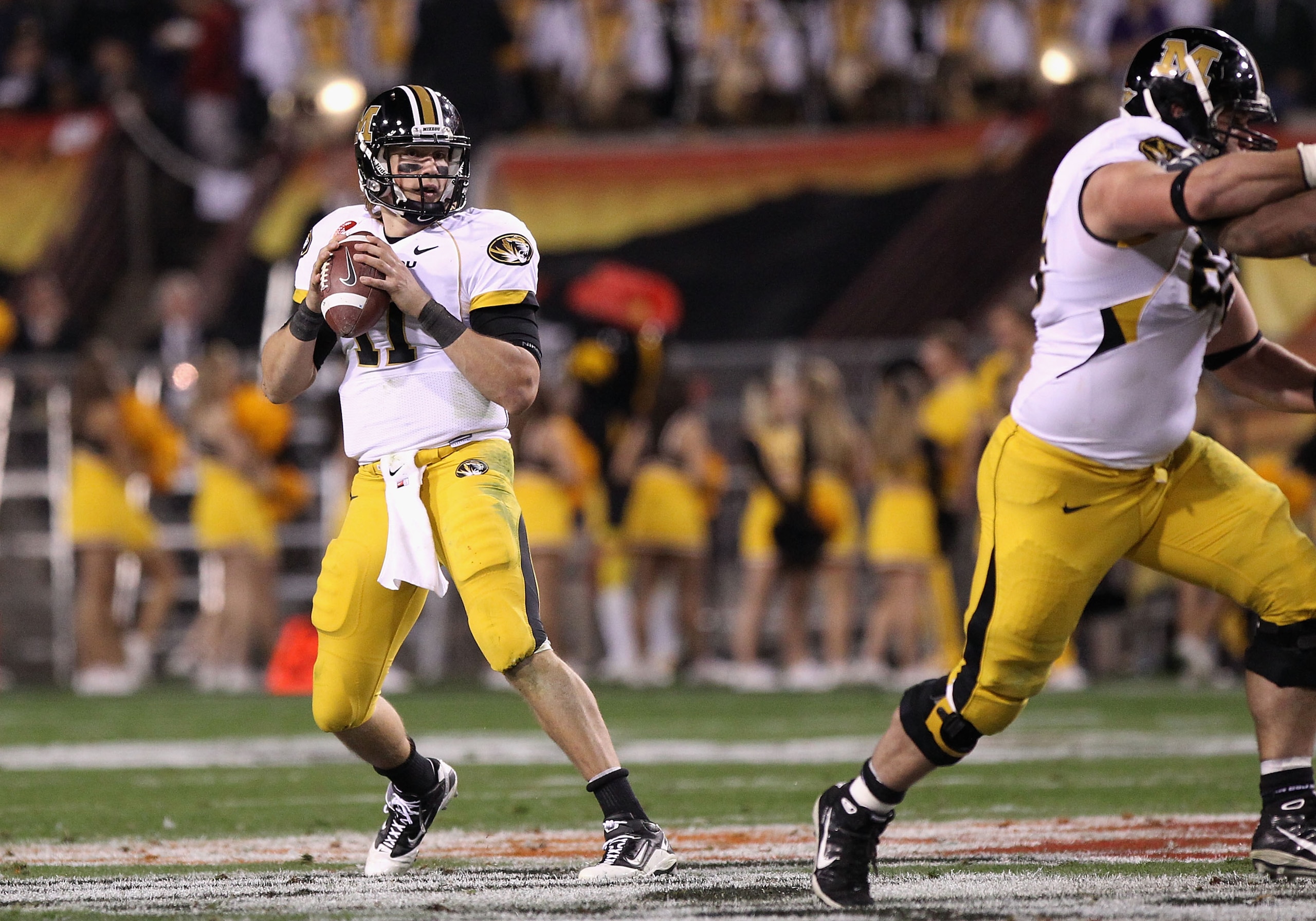 TEMPE, AZ - DECEMBER 28: Quarterback Blaine Gabbert #11 of the Missouri Tigers drops back to pass during the Insight Bowl against the Iowa Hawkeyes at Sun Devil Stadium on December 28, 2010 in Tempe, Arizona. The Hawkeyes defeated the Tigers 27-24. (P TEMPE, AZ - DECEMBER 28: Quarterback Blaine Gabbert #11 of the Missouri Tigers drops back to pass during the Insight Bowl against the Iowa Hawkeyes at Sun Devil Stadium on December 28, 2010 in Tempe, Arizona. The Hawkeyes defeated the Tigers 27-24. (P