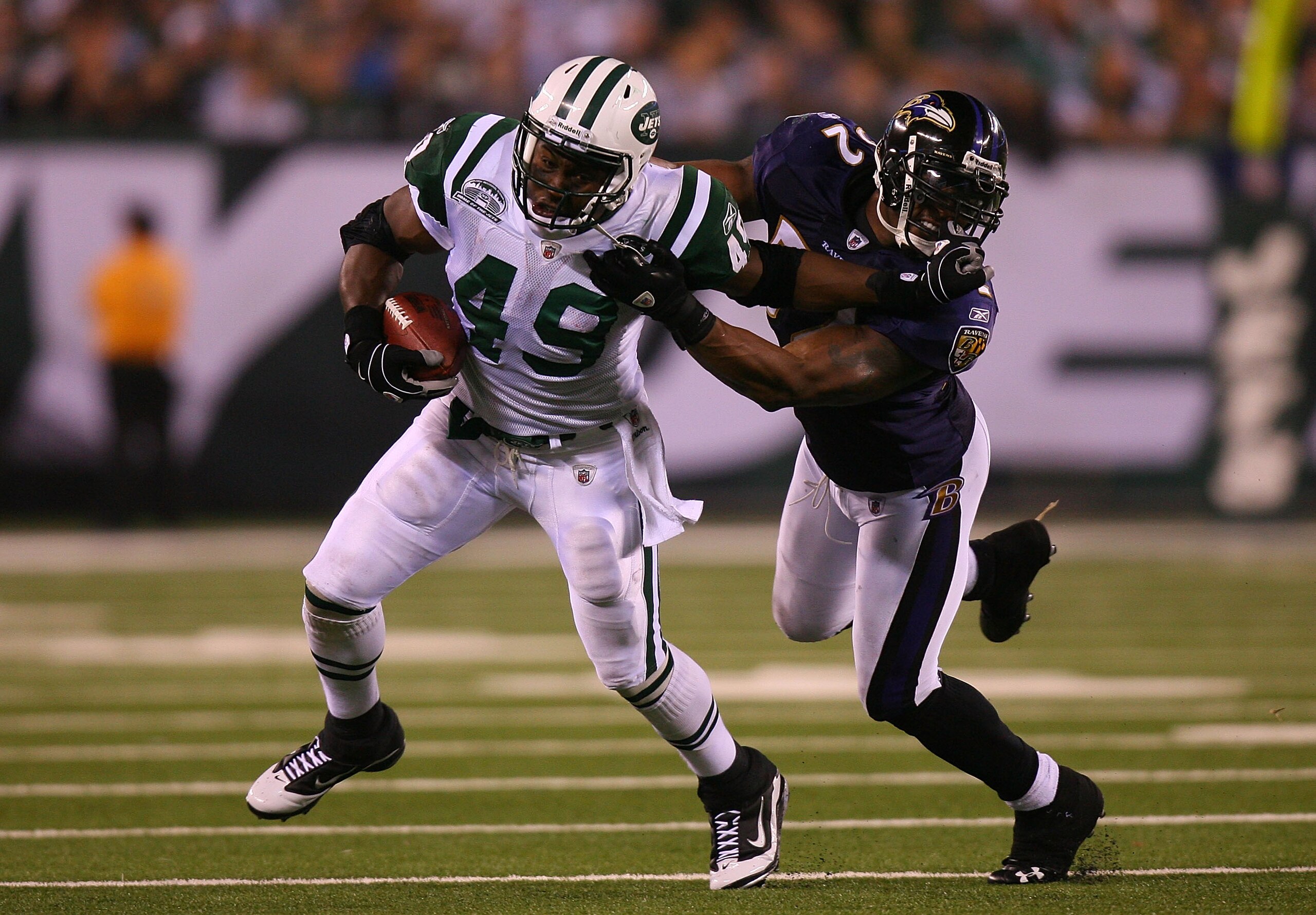 EAST RUTHERFORD, NJ - SEPTEMBER 13: Tony Richardson #49 of the New York Jets stiff arms Ray Lewis #52 of the Baltimore Ravens during their home opener at the New Meadowlands Stadium on September 13, 2010 in East Rutherford, New Jersey. (Photo by Andrew EAST RUTHERFORD, NJ - SEPTEMBER 13: Tony Richardson #49 of the New York Jets stiff arms Ray Lewis #52 of the Baltimore Ravens during their home opener at the New Meadowlands Stadium on September 13, 2010 in East Rutherford, New Jersey. (Photo by Andrew