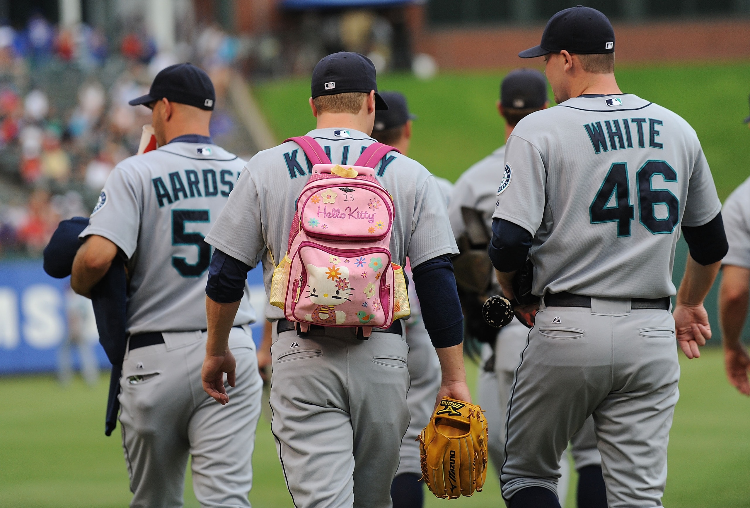 ARLINGTON, TX - JULY 31:  Rookie pitcher Shawn Kelley #23 of the Seattle Mariners walks to the bullpen while wearing a 'Hello Kitty' backpack before a game with the Texas Rangers on July 31, 2009 at Rangers Ballpark in Arlington, Texas.  (Photo by Ronald