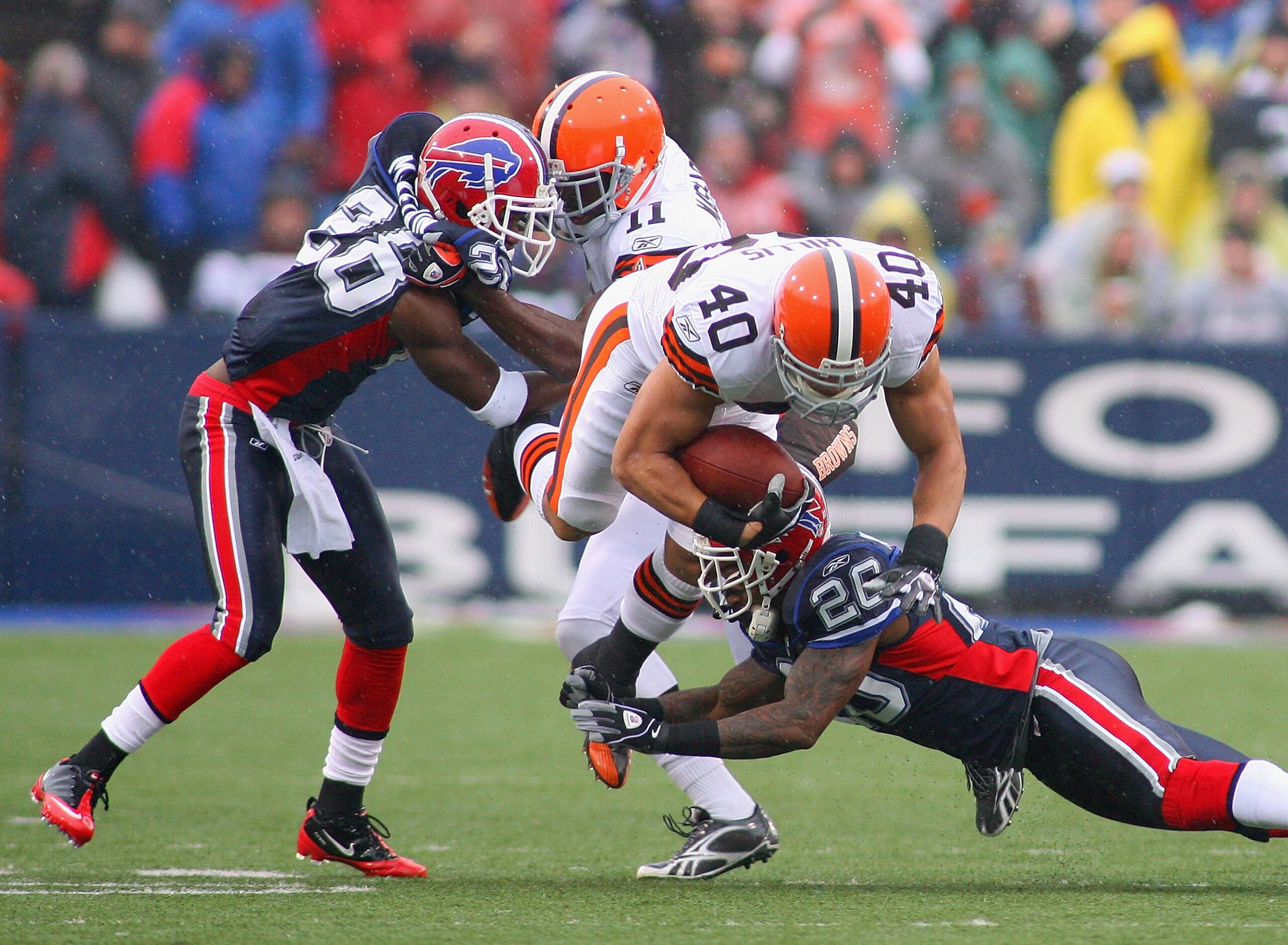 ORCHARD PARK, NY - DECEMBER 12: Peyton Hillis #41 of the Cleveland Browns is tackled by Ashton Youboty #26 of the Buffalo Bills  at Ralph Wilson Stadium on December 12, 2010 in Orchard Park, New York.  (Photo by Rick Stewart/Getty Images)
