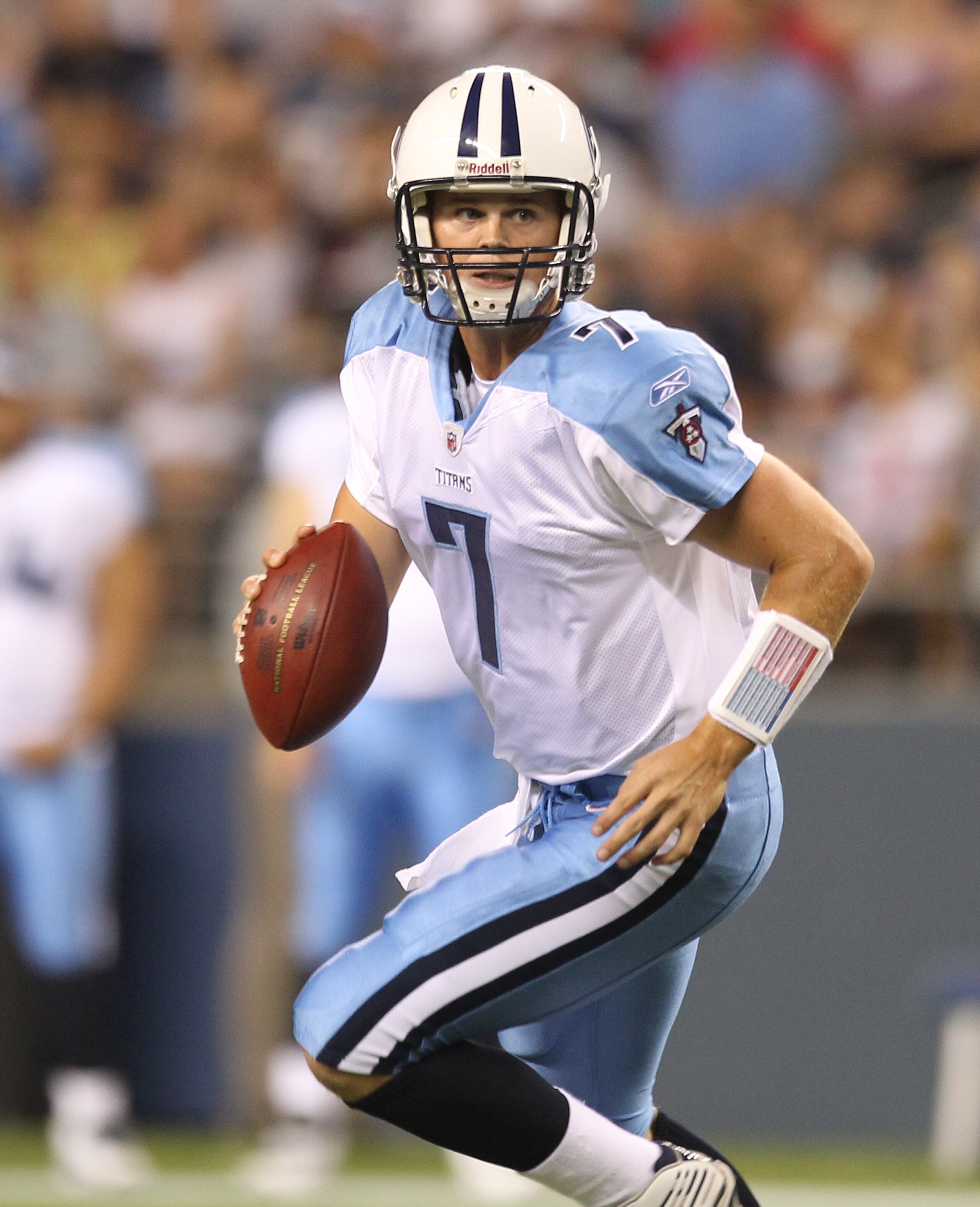 SEATTLE - AUGUST 14:  Quarterback Rusty Smith #7 of the Tennessee Titans rolls out to pass during the preseason game against the Seattle Seahawks at Qwest Field on August 14, 2010 in Seattle, Washington. (Photo by Otto Greule Jr/Getty Images)