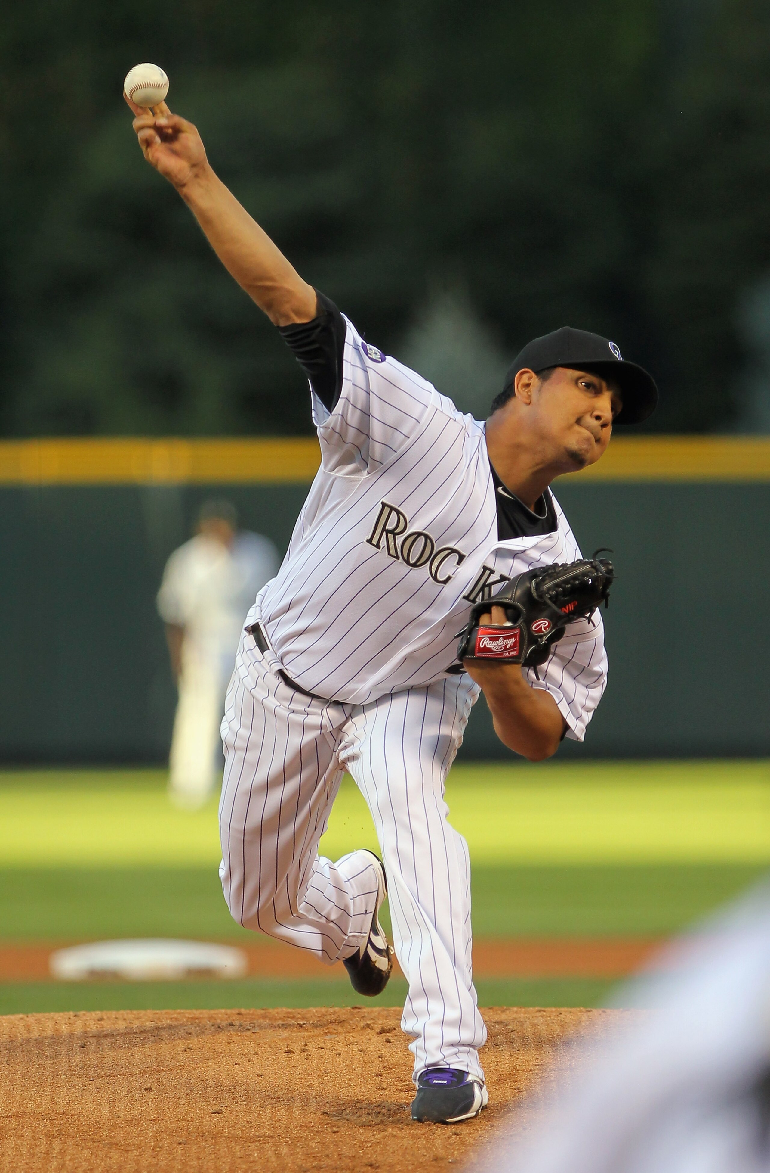 DENVER - SEPTEMBER 24:  Starting pitcher Jhoulys Chacin #45 of the Colorado Rockies delivers against the San Francisco Giants at Coors Field on September 24, 2010 in Denver, Colorado.  (Photo by Doug Pensinger/Getty Images)