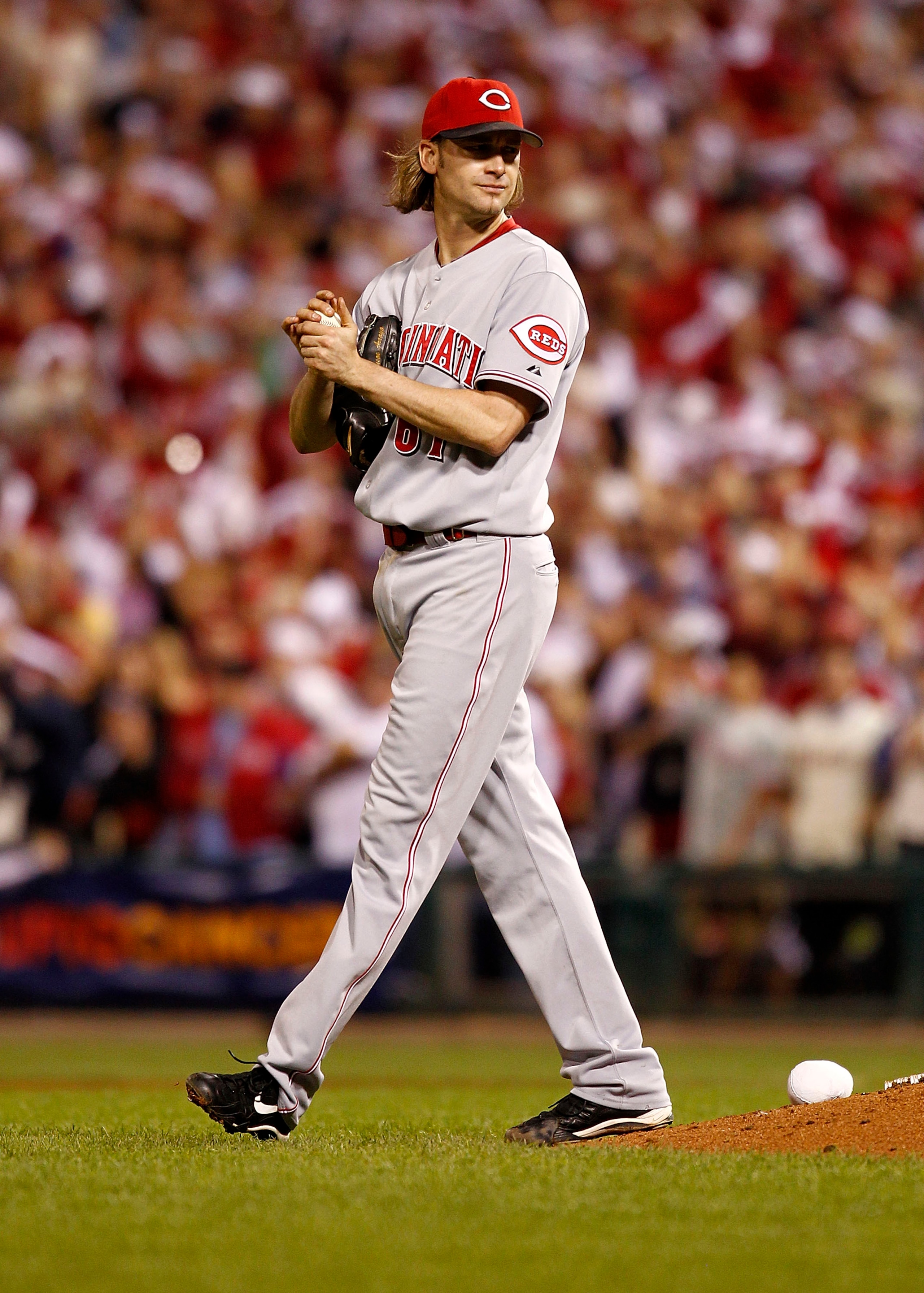 PHILADELPHIA - OCTOBER 08:  Bronson Arroyo #61 of the Cincinnati Reds walks to the mound in Game 2 of the NLDS against the Philadelphia Phillies at Citizens Bank Park on October 8, 2010 in Philadelphia, Pennsylvania.  (Photo by Jeff Zelevansky/Getty Image