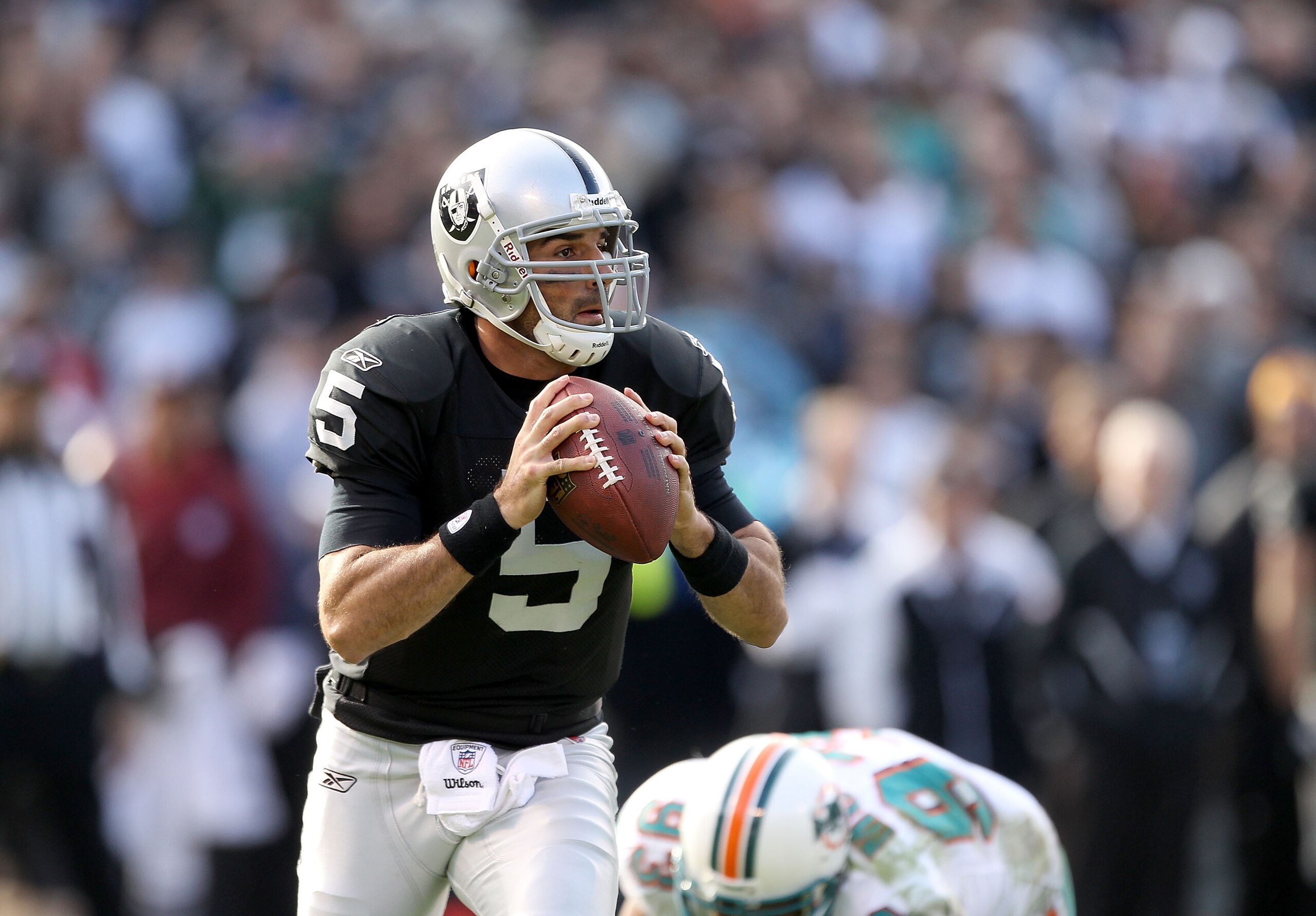 OAKLAND, CA - NOVEMBER 28: Bruce Gradkowski #5 of the Oakland Raiders in action against the Miami Dolphins at Oakland-Alameda County Coliseum on November 28, 2010 in Oakland, California. (Photo by Ezra Shaw/Getty Images) OAKLAND, CA - NOVEMBER 28: Bruce Gradkowski #5 of the Oakland Raiders in action against the Miami Dolphins at Oakland-Alameda County Coliseum on November 28, 2010 in Oakland, California. (Photo by Ezra Shaw/Getty Images)