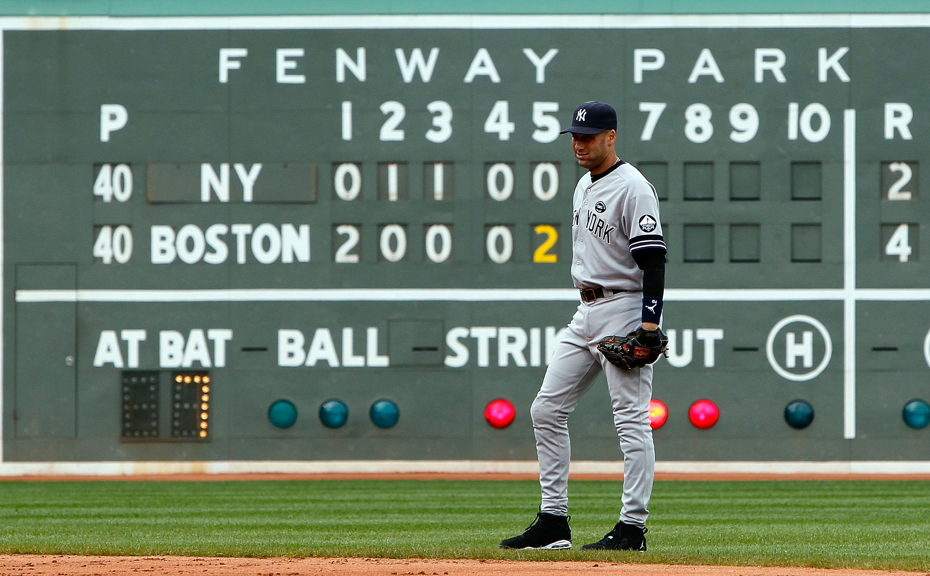 BOSTON - OCTOBER 3:  Derek Jeter #2 of the New York Yankees moves the the right side of the infield in preparation for batter David Ortiz #34 of the Boston Red Sox  during a game at Fenway Park, October 3, 2010, in Boston, Massachusetts. (Photo by Jim Rog