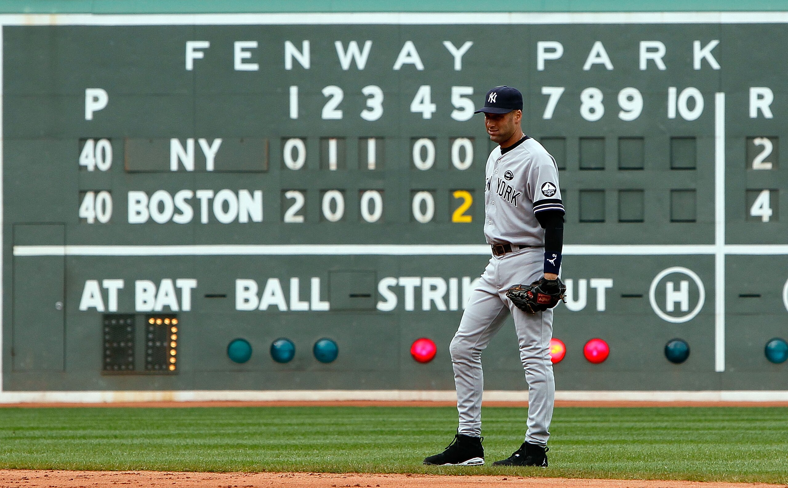 BOSTON - OCTOBER 3:  Derek Jeter #2 of the New York Yankees moves the the right side of the infield in preparation for batter David Ortiz #34 of the Boston Red Sox  during a game at Fenway Park, October 3, 2010, in Boston, Massachusetts. (Photo by Jim Rog