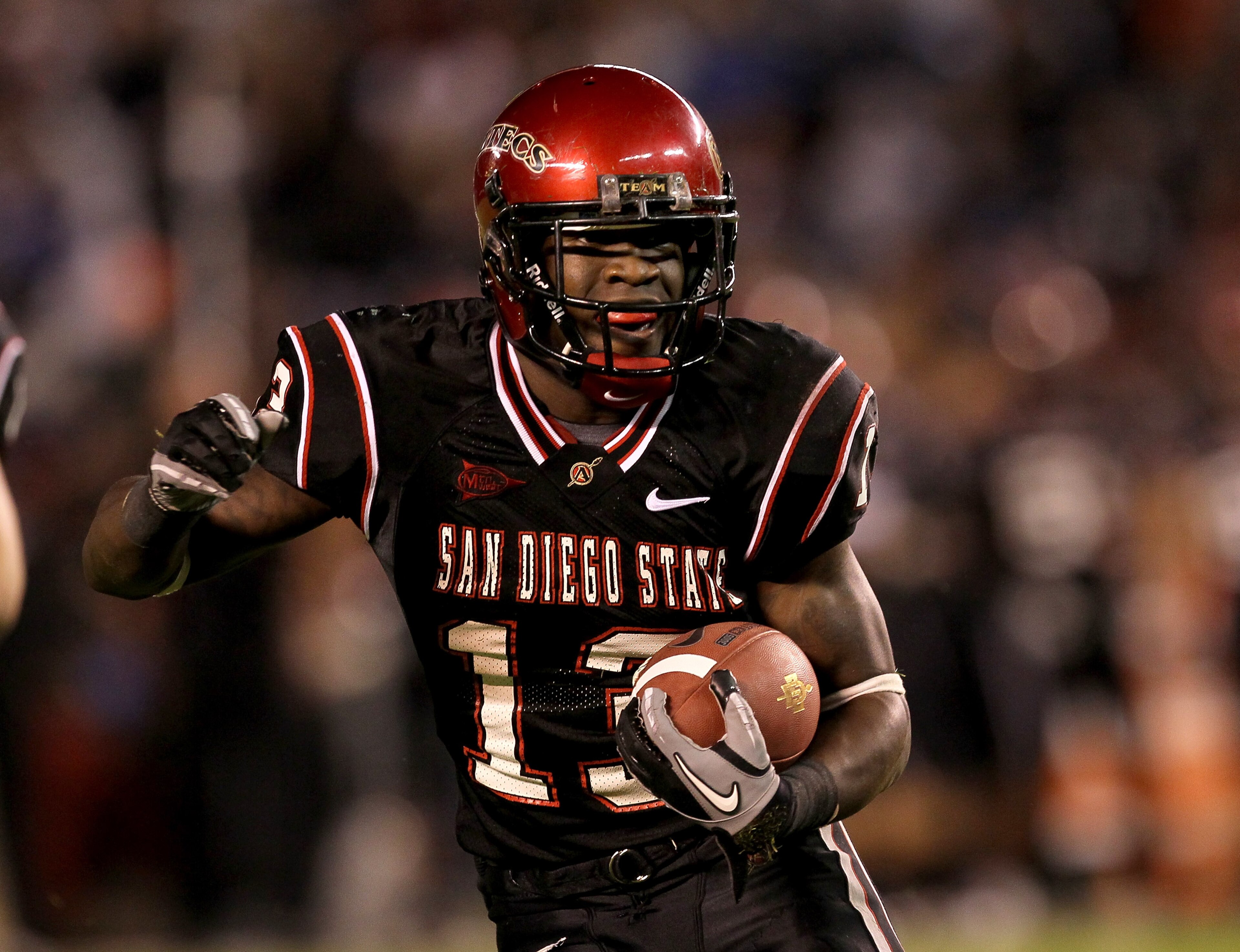 SAN DIEGO - NOVEMBER 20: Running back Ronnie Hillman #13 of the San Deigo State Aztecs carries the ball on a five yard touchdown run in the second quarter against the Utah Utes at Qualcomm Stadium on November 20, 2010 in San Diego, California. (Photo by SAN DIEGO - NOVEMBER 20: Running back Ronnie Hillman #13 of the San Deigo State Aztecs carries the ball on a five yard touchdown run in the second quarter against the Utah Utes at Qualcomm Stadium on November 20, 2010 in San Diego, California. (Photo by