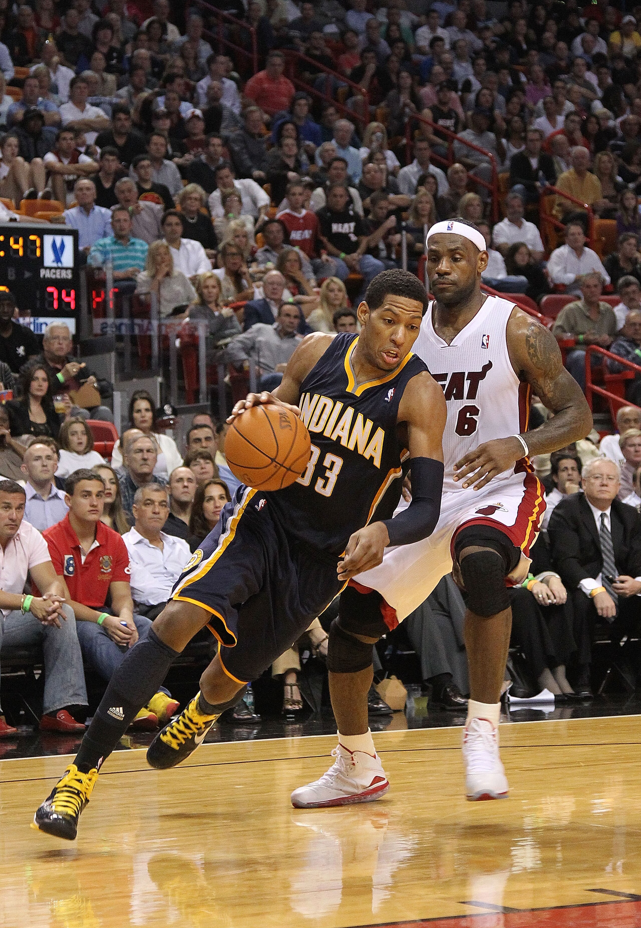MIAMI - NOVEMBER 22:  Danny Granger #33 of the Indiana Pacers dribbles around LeBron James #6 of the Miami Heat during a game at American Airlines Arena on November 22, 2010 in Miami, Florida. NOTE TO USER: User expressly acknowledges and agrees that, by