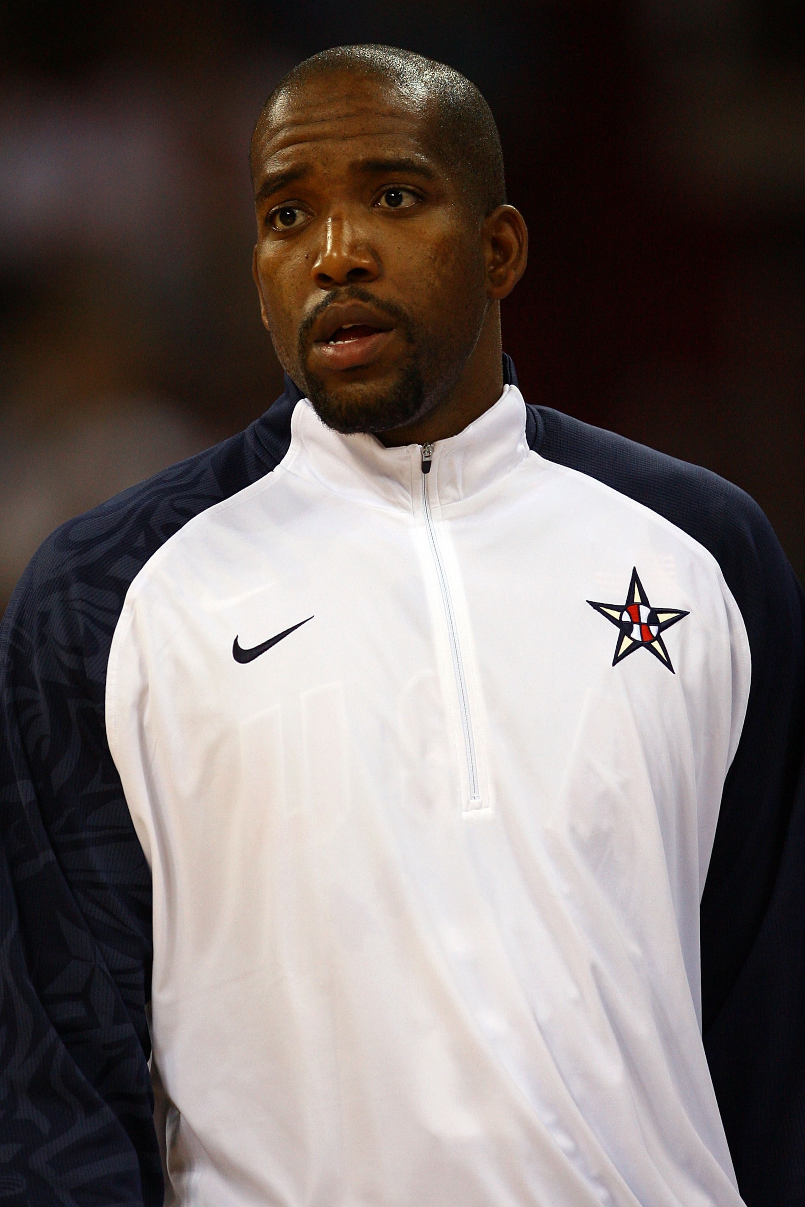 BEIJING - AUGUST 12:  Michael Redd #8 of the United States looks on during the US national anthem before taking on Angola during the men's preliminary round basketball game at the Beijing Olympic Basketball Gymnasium during Day 4 of the Beijing 2008 Olymp
