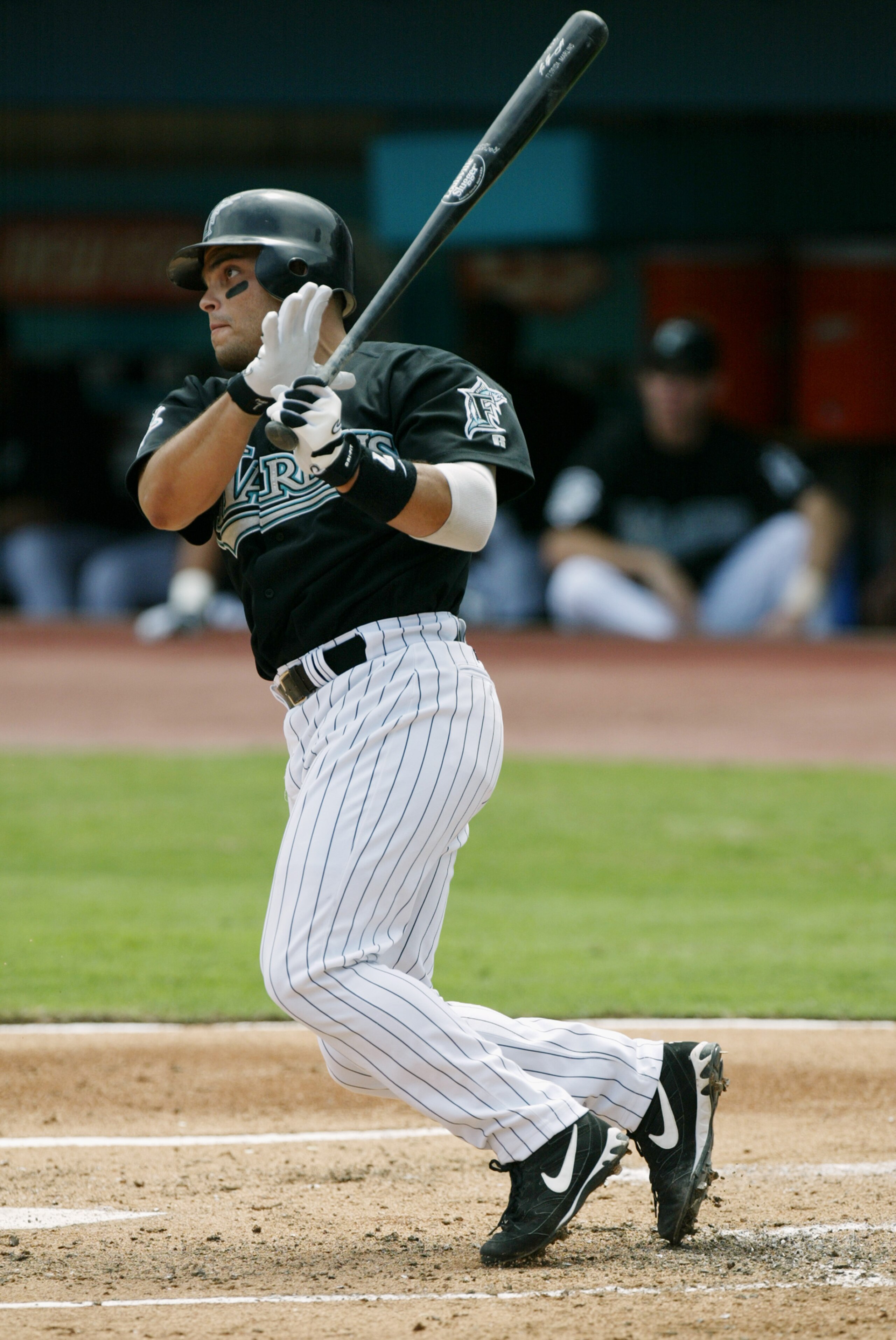 MIAMI - OCTOBER 4: Catcher Pudge Rodriguez #7 of the Florida Marlins connects with a San Francisco Giants pitch during the National League Division Series at Pro Player Stadium on October 4, 2003 in Miami, Florida. Marlins defeated the Giants 7-6. (Pho MIAMI - OCTOBER 4: Catcher Pudge Rodriguez #7 of the Florida Marlins connects with a San Francisco Giants pitch during the National League Division Series at Pro Player Stadium on October 4, 2003 in Miami, Florida. Marlins defeated the Giants 7-6. (Pho