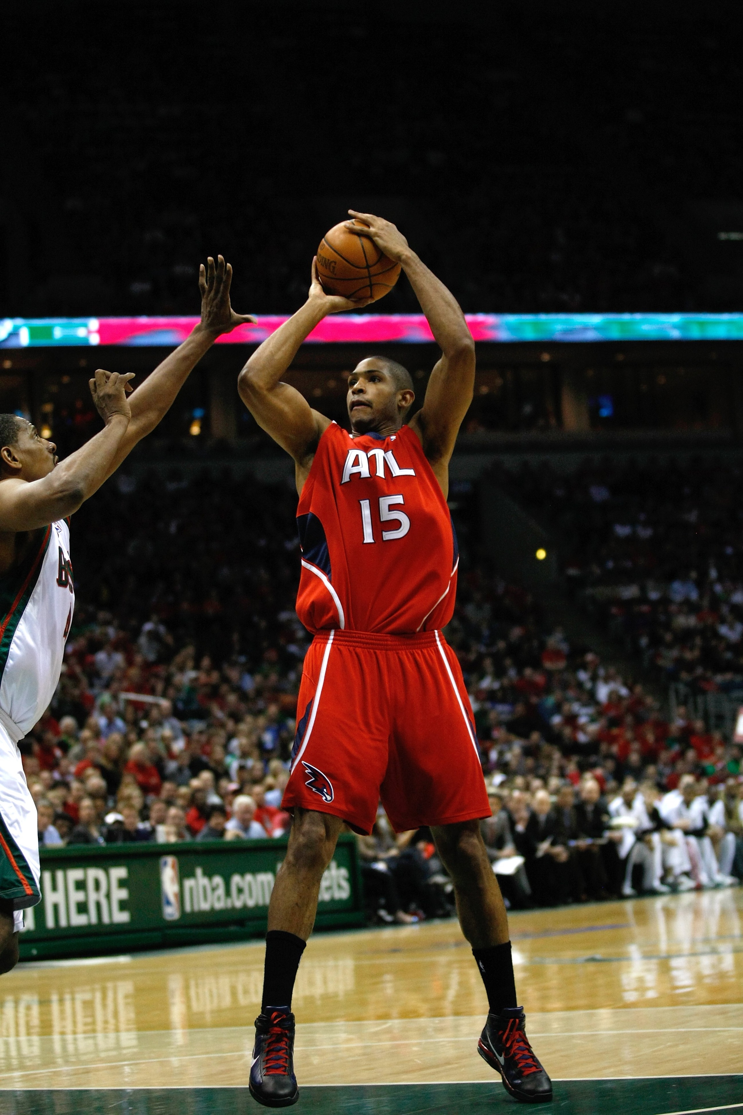 MILWAUKEE, WI - APRIL 24: Al Horford #15 of the Atlanta Hawks shoots the basketball against the Milwaukee Bucks during Game Three of Eastern Conference Quarterfinals of the 2010 NBA Playoffs at the Bradley Center on April 24, 2010 in Milwaukee, Wisconsin.
