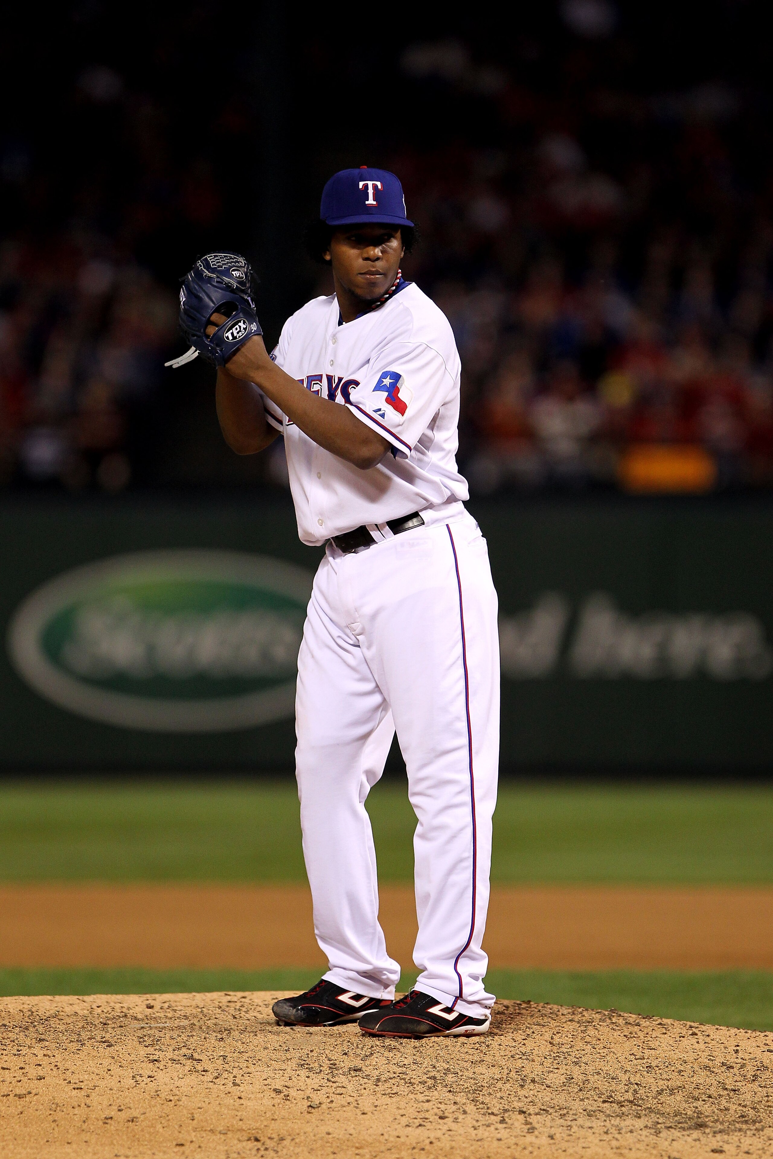 ARLINGTON, TX - NOVEMBER 01:  Neftali Feliz #30 of the Texas Rangers pitches against the San Francisco Giants in Game Five of the 2010 MLB World Series at Rangers Ballpark in Arlington on November 1, 2010 in Arlington, Texas. The Giants won 3-1.  (Photo b