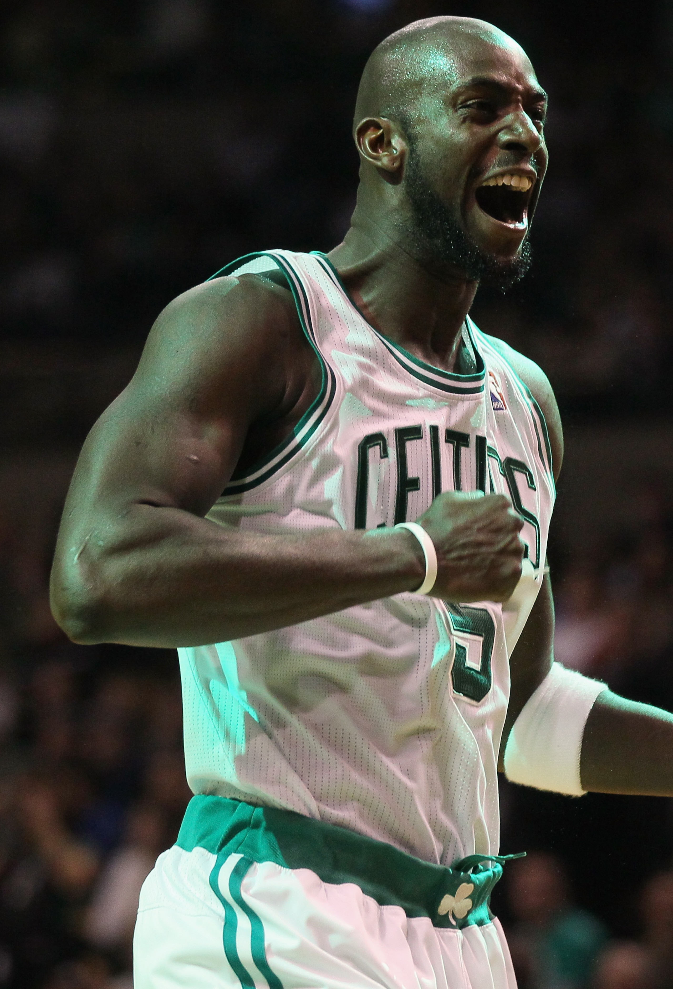BOSTON, MA - JANUARY 17:  Kevin Garnett #5 of the Boston Celtics does his pregame scream to the crowd before the opening tipoff against the Orlando Magic on January 17, 2011 at the TD Garden in Boston, Massachusetts. Garnett missed several weeks due to a