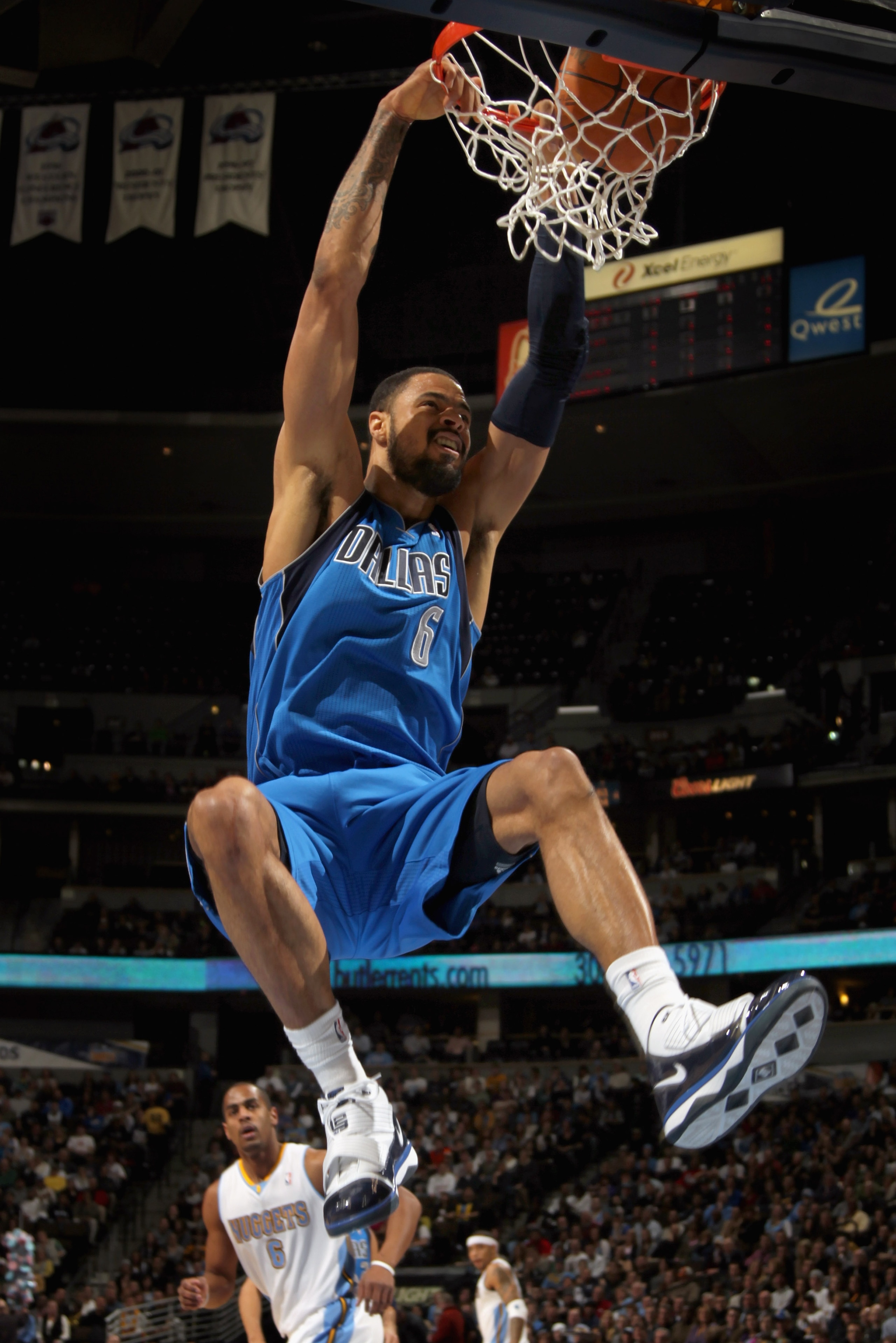 DENVER, CO - FEBRUARY 10:  Tyson Chandler #6 of the Dallas Mavericks dunks the ball against the Denver Nuggets during NBA action at the Pepsi Center on February 10, 2011 in Denver, Colorado. NOTE TO USER: User expressly acknowledges and agrees that, by do