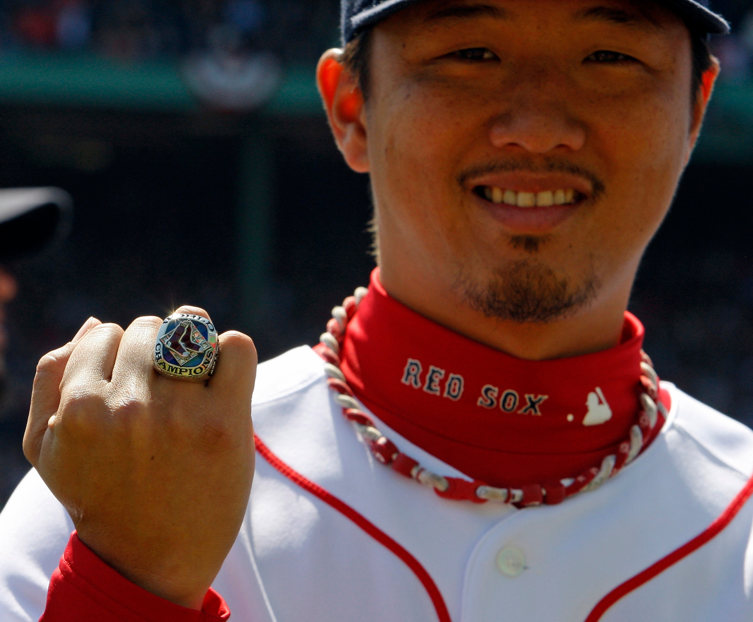 BOSTON - APRIL 08:  Hideki Okajima of the Boston Red Sox shows off his 2007 World Series ring during pre-game ceremonies before the Red Sox MLB baseball game against the Detroit Tigers on April 8, 2008 at Fenway Park in Boston, Massachusetts. Red Sox play