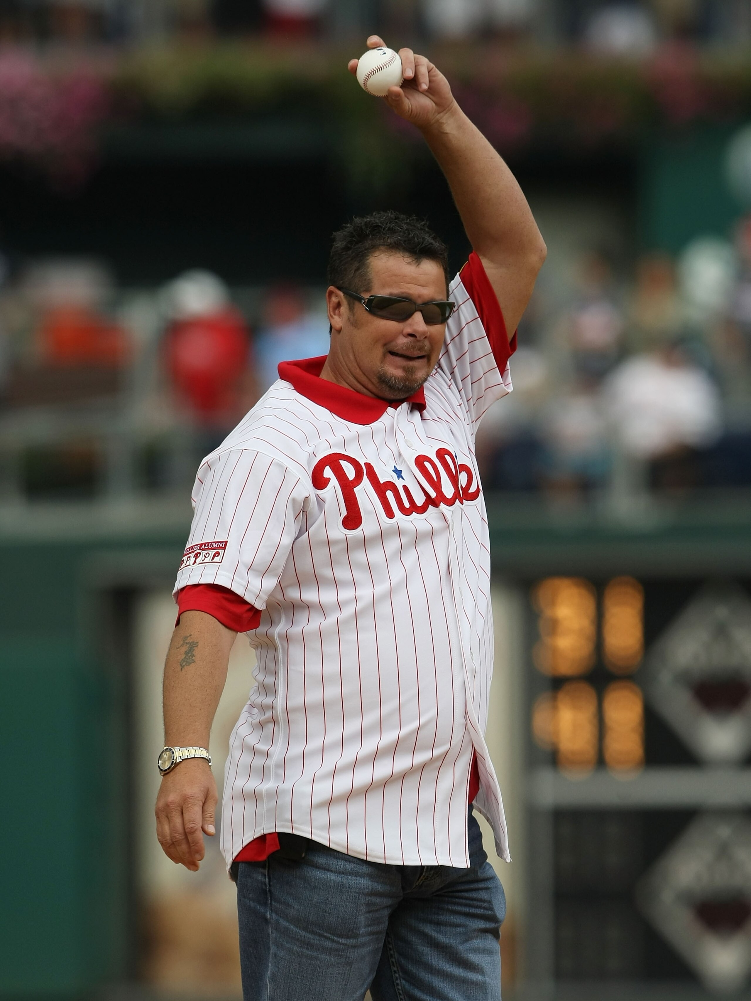 PHILADELPHIA - OCTOBER 01: Former Phillies pitcher, Mitch Williams throws out the ceremonial first pitch prior to the game between the Milwaukee Brewers and the Philadelphia Phillies during Game 1 of the NLDS Playoffs at Citizens Bank Ballpark on October