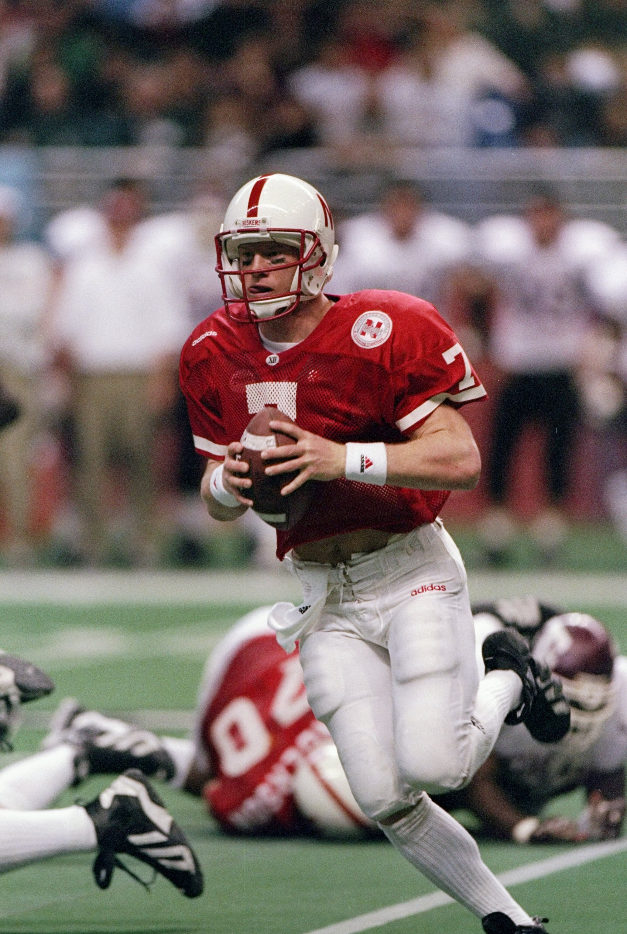 6 Dec 1997: Quarterback Scott Frost of the Nebraska Cornhuskers looks to pass the ball during a game against the Texas A&M Aggies at the Alamodome in San Antonio, Texas. Nebraska won the game, 54-15.
