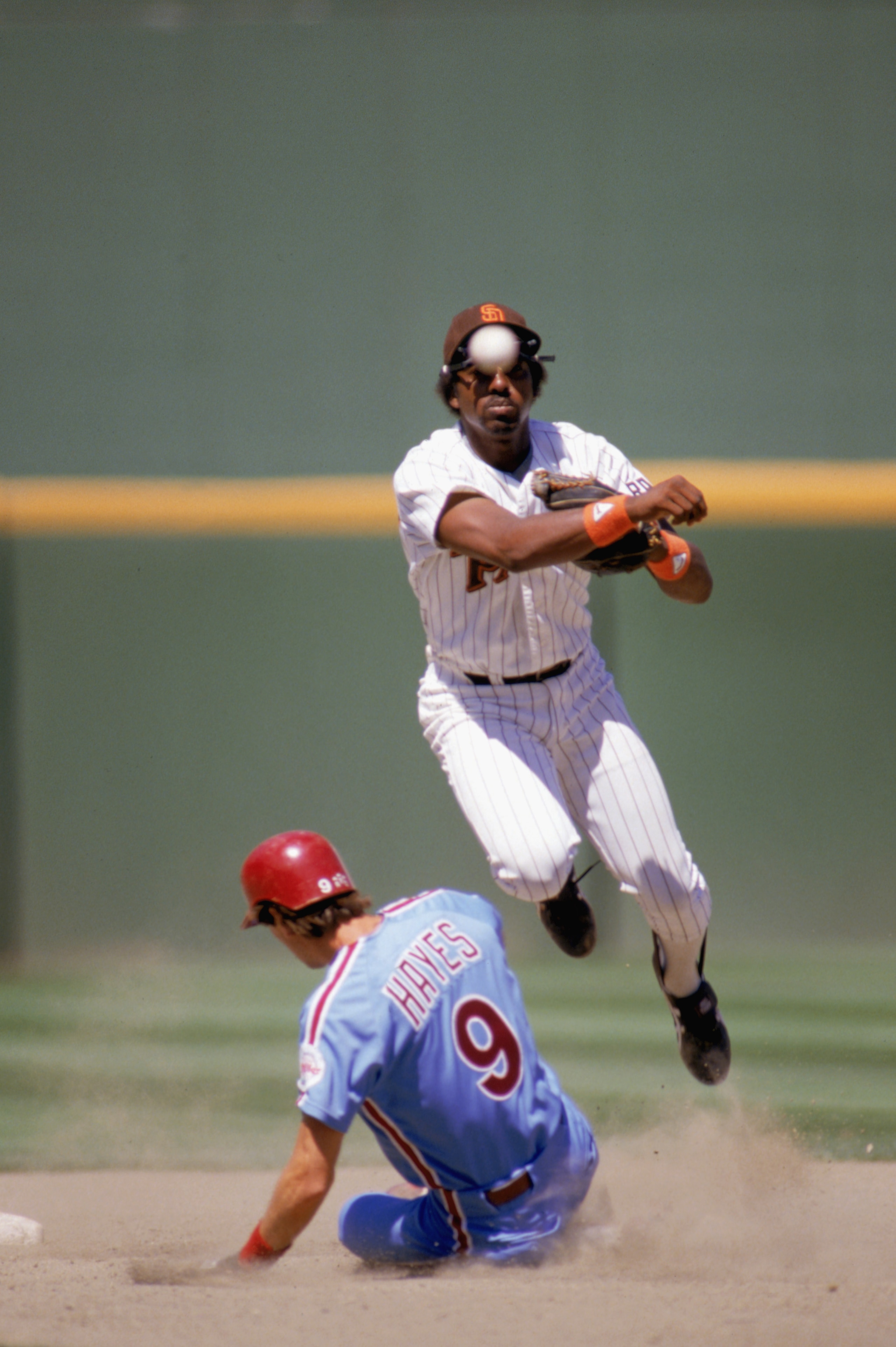 1986:  Garry Templeton of the San Diego Padres throws the ball for a double play during the 1986 season. (Photo by Stephen Dunn/Getty Images)