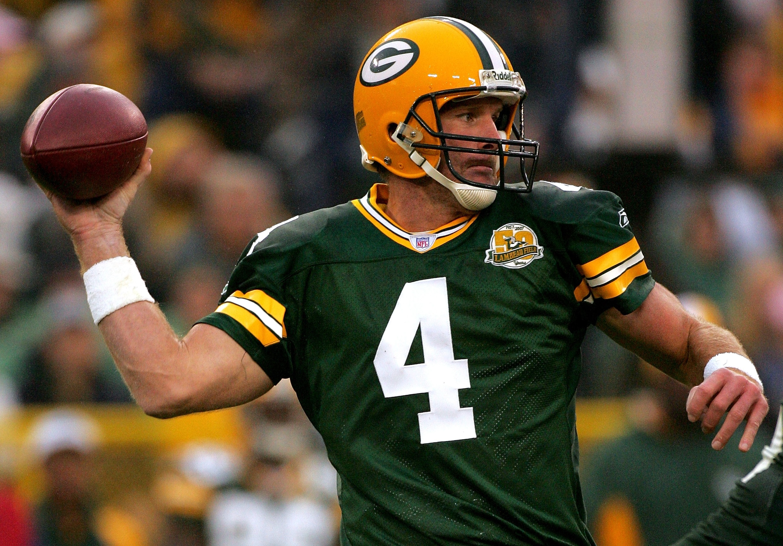 GREEN BAY, WI - OCTOBER 14:  Brett Favre #4 of the Green Bay Packers throws against the Washington Redskins October 14, 2007 at Lambeau Field in Green Bay, Wisconsin.  (Photo by Matthew Stockman/Getty Images)