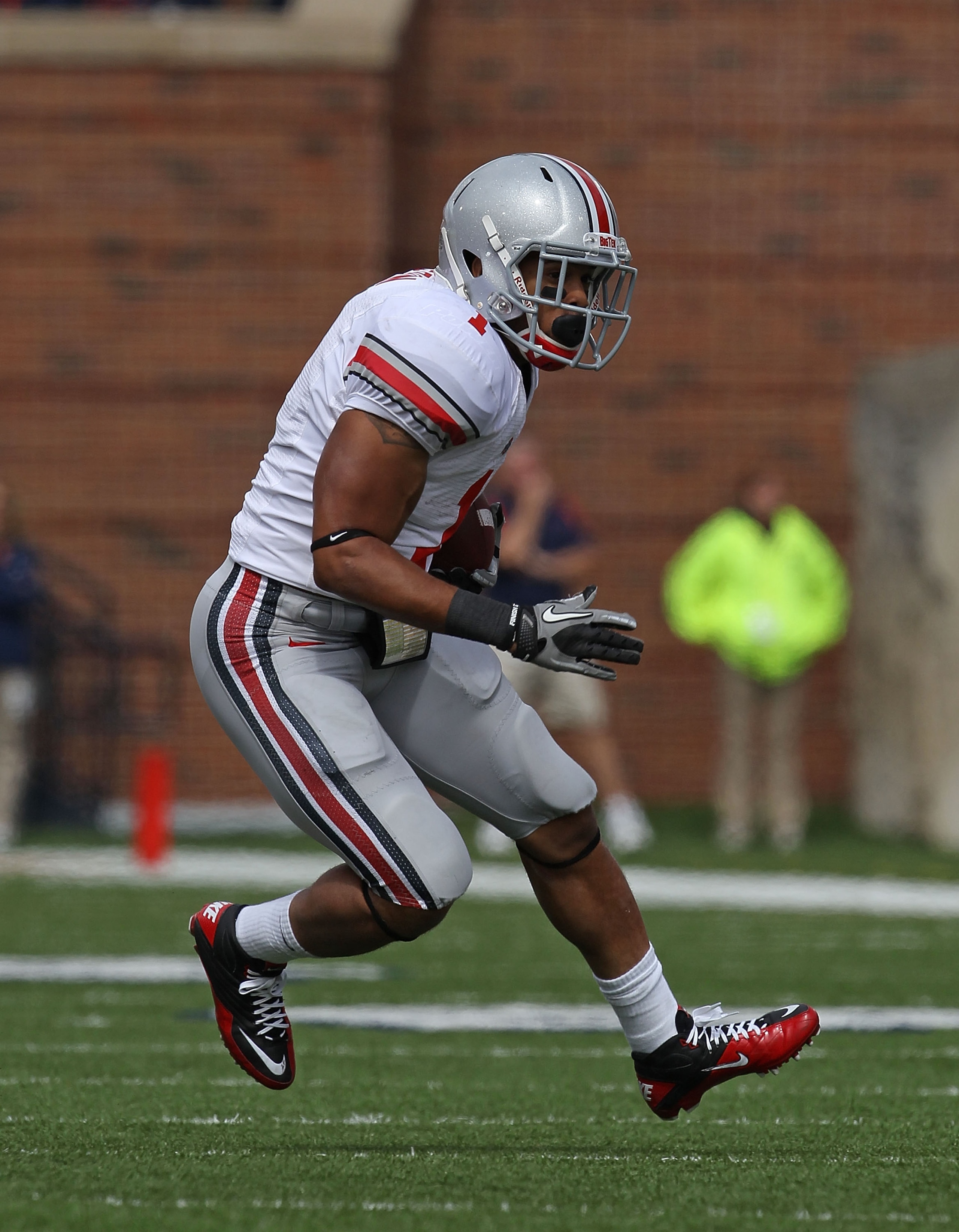 CHAMPAIGN, IL - OCTOBER 02: Dan Herron #1 of the Ohio State Buckeyes runs against the Illinois Fighting Illini at Memorial Stadium on October 2, 2010 in Champaign, Illinois. Ohio State defeated Illinois 24-13. (Photo by Jonathan Daniel/Getty Images) CHAMPAIGN, IL - OCTOBER 02: Dan Herron #1 of the Ohio State Buckeyes runs against the Illinois Fighting Illini at Memorial Stadium on October 2, 2010 in Champaign, Illinois. Ohio State defeated Illinois 24-13. (Photo by Jonathan Daniel/Getty Images)