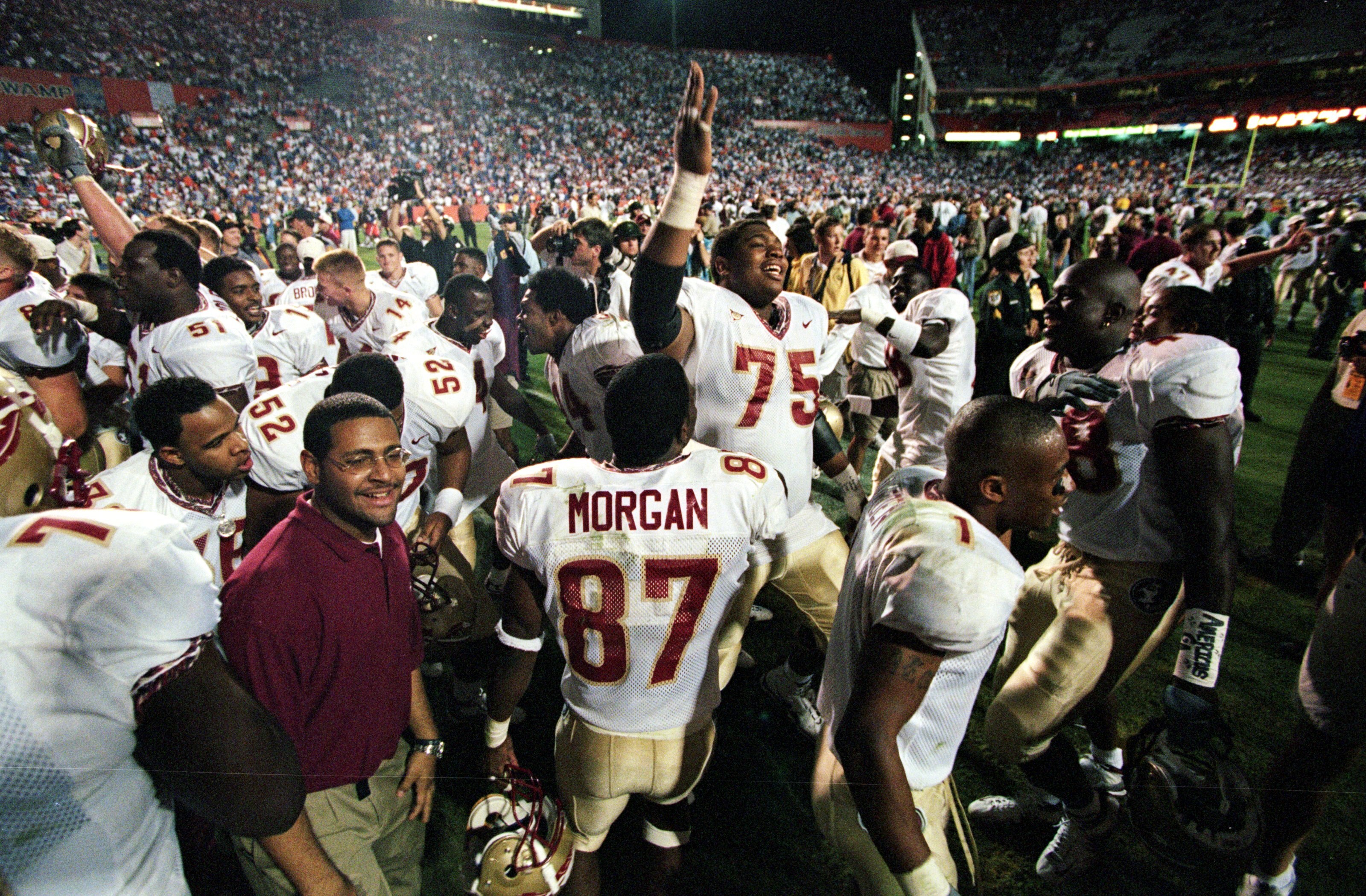 20 Nov 1999:  Char-ron Dorsey #75 of the Florida State Seminoles celebrates with teammates after the game against the Florida Gators at the Ben HillGriffin Stadium in Gainsville, Florida. The Seminoles defeated the Gators 23-30. Mandatory Credit: Andy Lyo