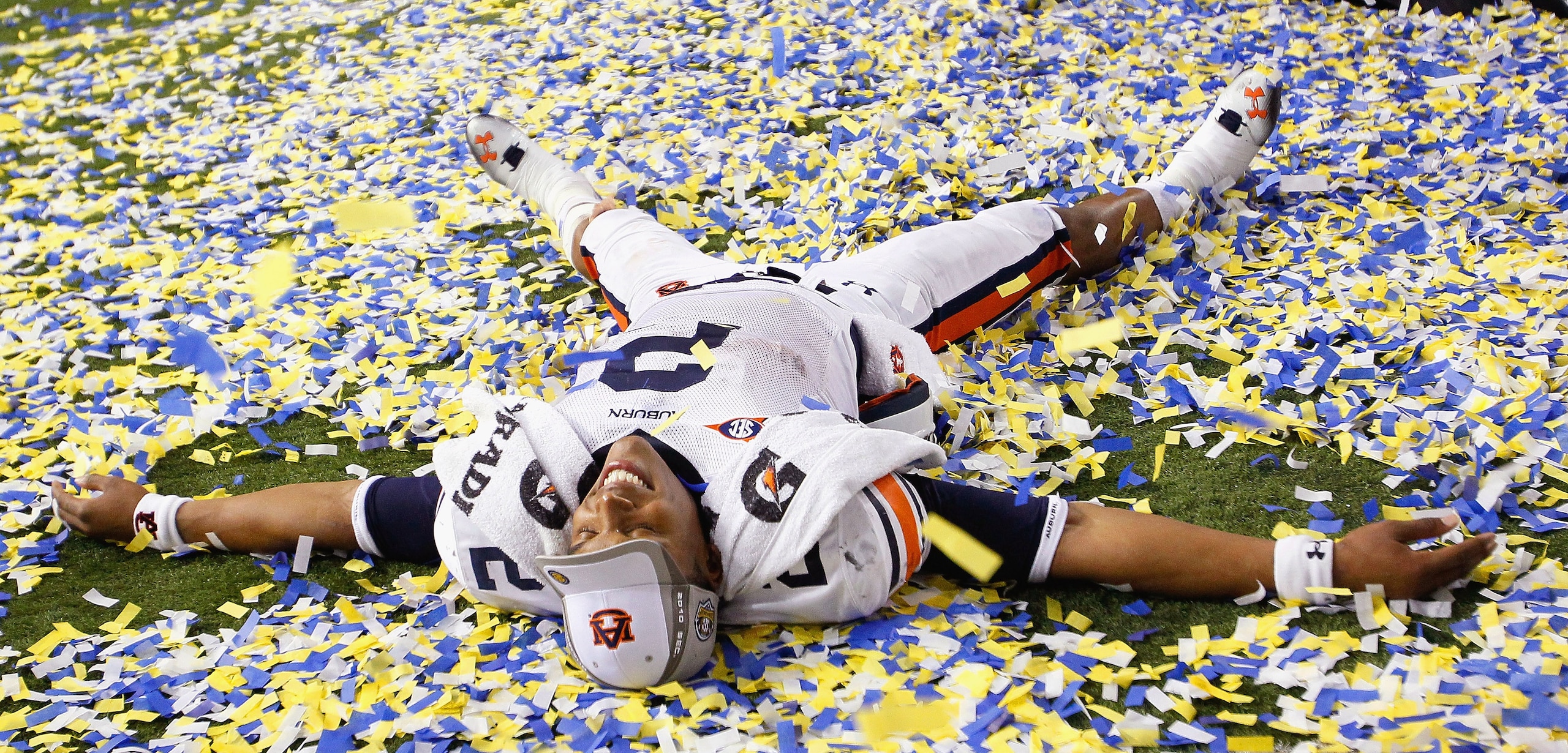 ATLANTA, GA - DECEMBER 04:  Quarterback Cam Newton #2 of the Auburn Tigers celebrates after their 56-17 win over the South Carolina Gamecocks during the 2010 SEC Championship at Georgia Dome on December 4, 2010 in Atlanta, Georgia.   (Photo by Kevin C. Co