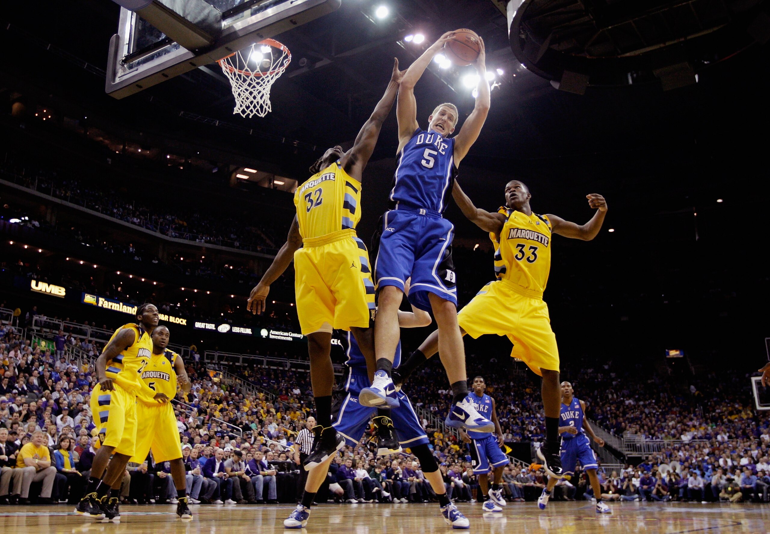 KANSAS CITY, MO - NOVEMBER 22: Mason Plumlee #5 of the Duke Blue Devils grabs a rebound during the CBE Classic game against the Marquette Golden Eagles on November 22, 2010 at the Sprint Center in Kansas City, Missouri. (Photo by Jamie Squire/Getty Image KANSAS CITY, MO - NOVEMBER 22: Mason Plumlee #5 of the Duke Blue Devils grabs a rebound during the CBE Classic game against the Marquette Golden Eagles on November 22, 2010 at the Sprint Center in Kansas City, Missouri. (Photo by Jamie Squire/Getty Image