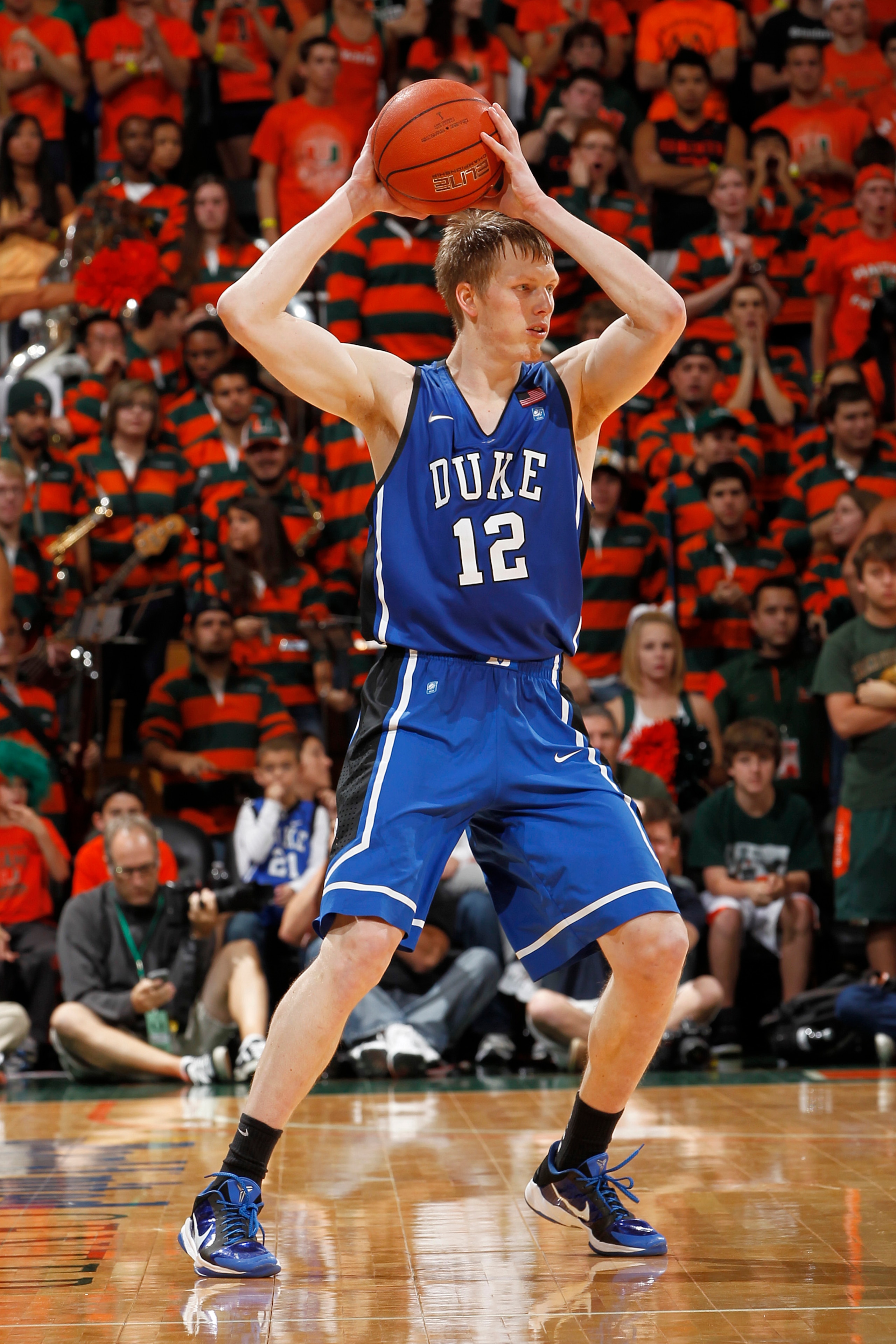 CORAL GABLES, FL - FEBRUARY 13: Kyle Singler #12 of the Duke Blue Devils passes the ball against the Miami Hurricanes on February 13, 2011 at the BankUnited Center in Coral Gables, Florida. (Photo by Joel Auerbach/Getty Images) CORAL GABLES, FL - FEBRUARY 13: Kyle Singler #12 of the Duke Blue Devils passes the ball against the Miami Hurricanes on February 13, 2011 at the BankUnited Center in Coral Gables, Florida. (Photo by Joel Auerbach/Getty Images)