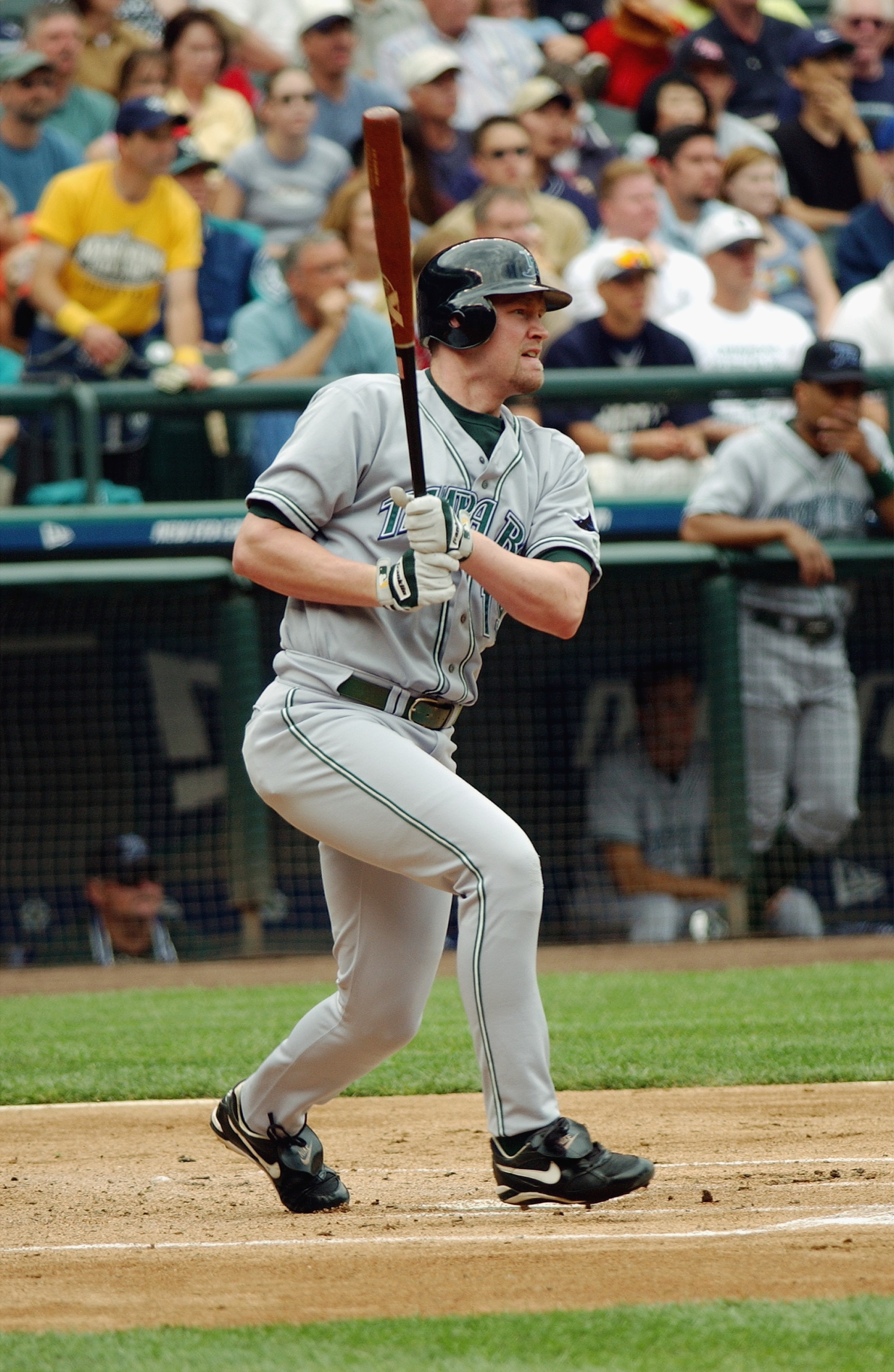 SEATTLE, WA- JULY 13: Infielder Aubrey Huff #19 of the Tampa Bay Devil Rays keeps an eye on the ball as he moves to first base against the Seattle Mariners during the game on July 13, 2003 at Safeco Field in Seattle, Washington. The Mariners defeated the SEATTLE, WA- JULY 13: Infielder Aubrey Huff #19 of the Tampa Bay Devil Rays keeps an eye on the ball as he moves to first base against the Seattle Mariners during the game on July 13, 2003 at Safeco Field in Seattle, Washington. The Mariners defeated the