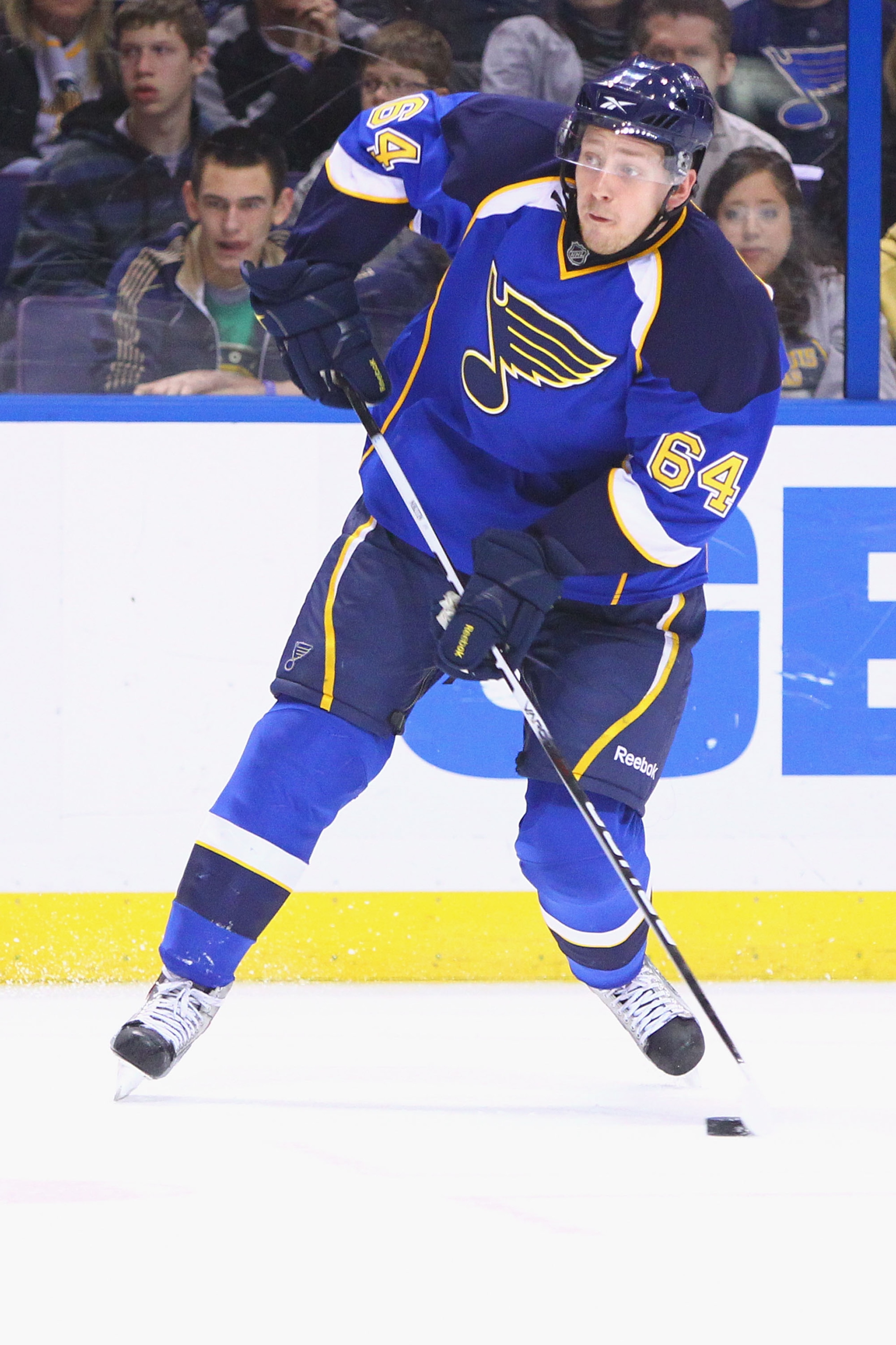 ST. LOUIS, MO - FEBRUARY 11: Nikita Nikitin #64 of the St. Louis Blues shoots the puck against the St. Louis Blues at the Scottrade Center on February 11, 2011 in St. Louis, Missouri.  The Wild won 5-4 in a shootout.  (Photo by Dilip Vishwanat/Getty Image