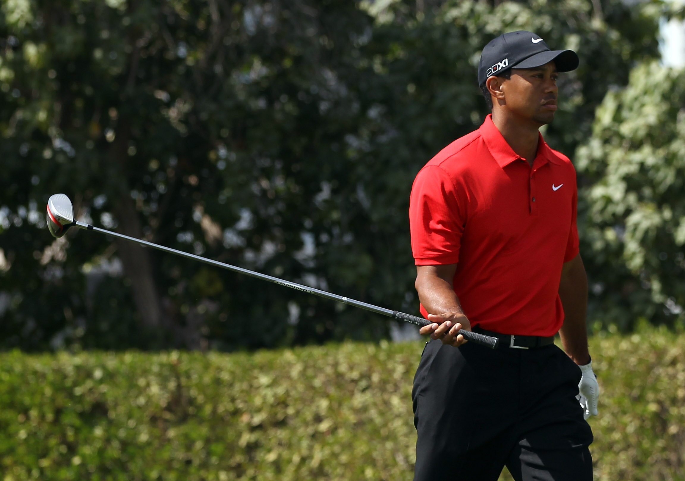 DUBAI, UNITED ARAB EMIRATES - FEBRUARY 13:  Tiger Woods of the USA during the final round of the Omega Dubai Desert Classic on the Majlis course at the Emirates Golf Club on February 13, 2011 in Dubai, United Arab Emirates.  (Photo by Ross Kinnaird/Getty