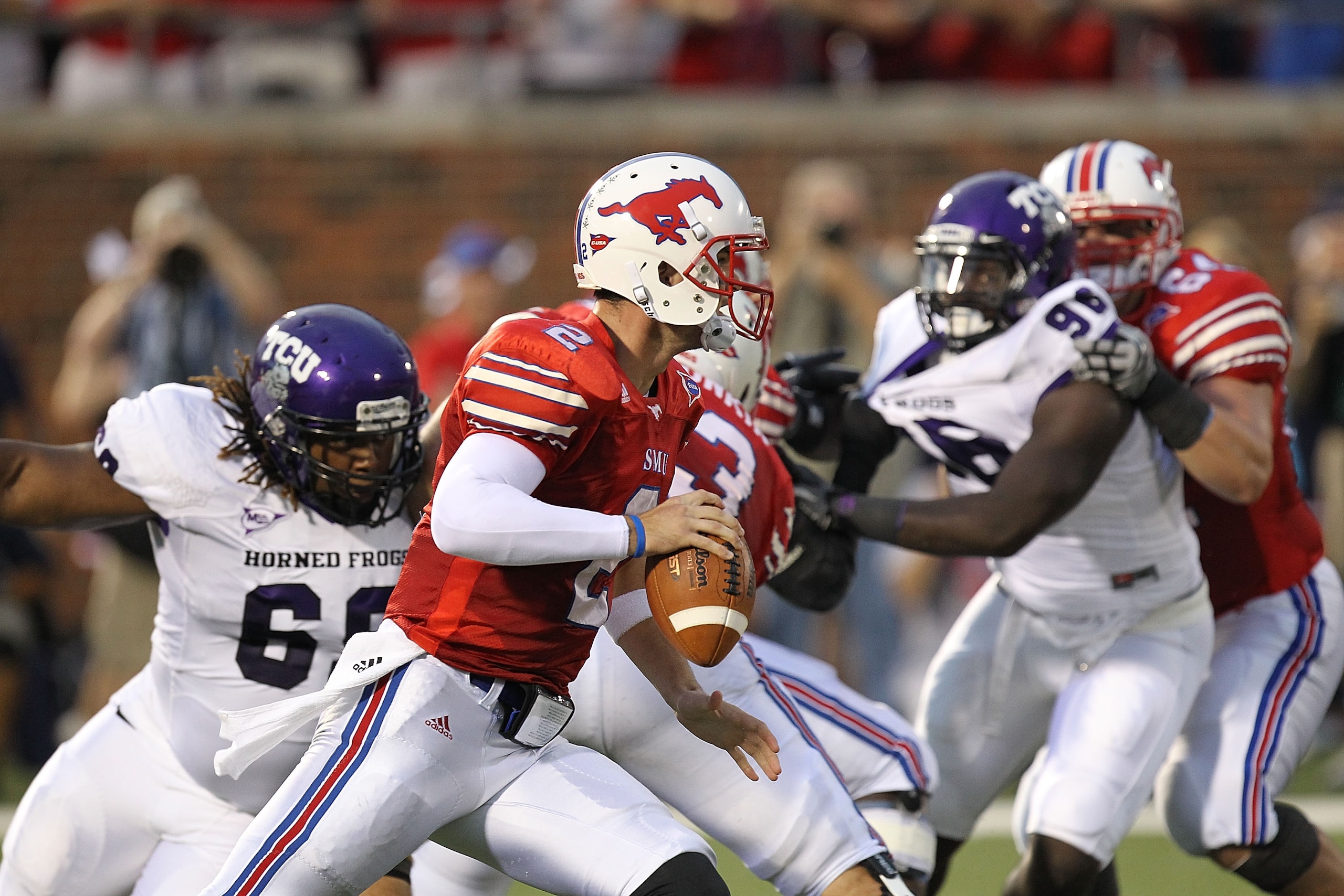 DALLAS - SEPTEMBER 24: Quarterback Kyle Padron #2 of the SMU Mustangs looks to pass against the TCU Horned Frogs at Gerald J. Ford Stadium on September 24, 2010 in Dallas, Texas. (Photo by Ronald Martinez/Getty Images) DALLAS - SEPTEMBER 24: Quarterback Kyle Padron #2 of the SMU Mustangs looks to pass against the TCU Horned Frogs at Gerald J. Ford Stadium on September 24, 2010 in Dallas, Texas. (Photo by Ronald Martinez/Getty Images)