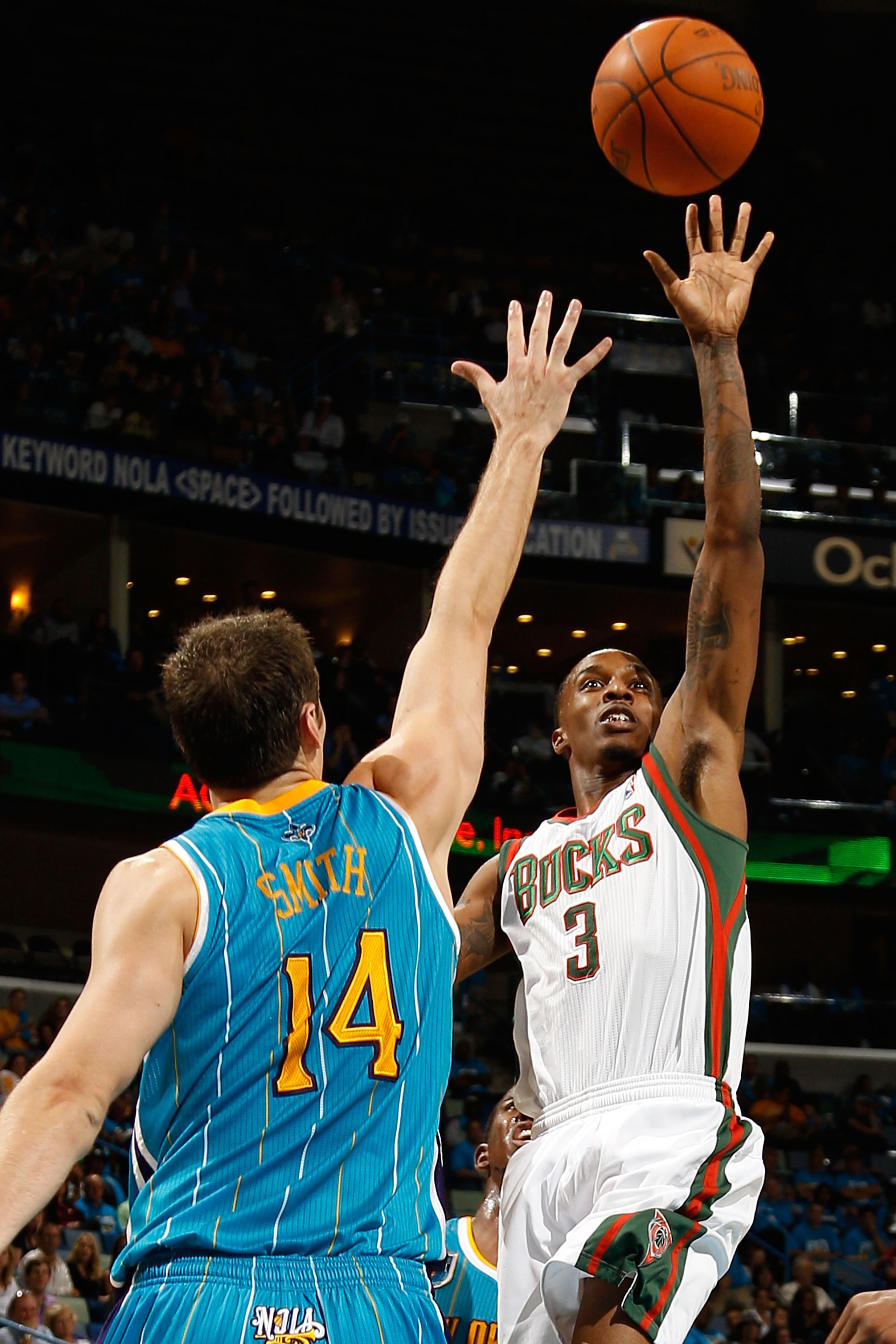 NEW ORLEANS - OCTOBER 27: Brandon Jennings #3 of the Milwaukee Bucks shoots the ball over Jason Smith #14 of the New Orleans Hornets at the New Orleans Arena on October 27, 2010 in New Orleans, Louisiana. The Hornets defeated the Bucks 95-91. NOTE TO NEW ORLEANS - OCTOBER 27: Brandon Jennings #3 of the Milwaukee Bucks shoots the ball over Jason Smith #14 of the New Orleans Hornets at the New Orleans Arena on October 27, 2010 in New Orleans, Louisiana. The Hornets defeated the Bucks 95-91. NOTE TO