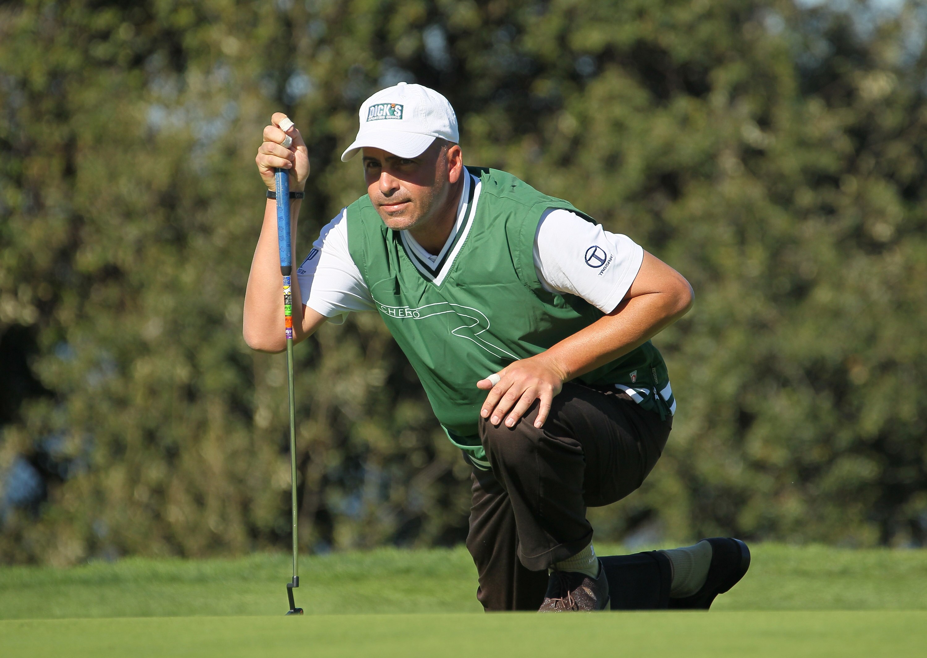 LA JOLLA, CA - JANUARY 28:  Rocco Mediate lines up a putt on the second hole during round two of the Farmers Insurance Open at Torrey Pines South Course on January 28, 2011 in La Jolla, California.  (Photo by Stephen Dunn/Getty Images)